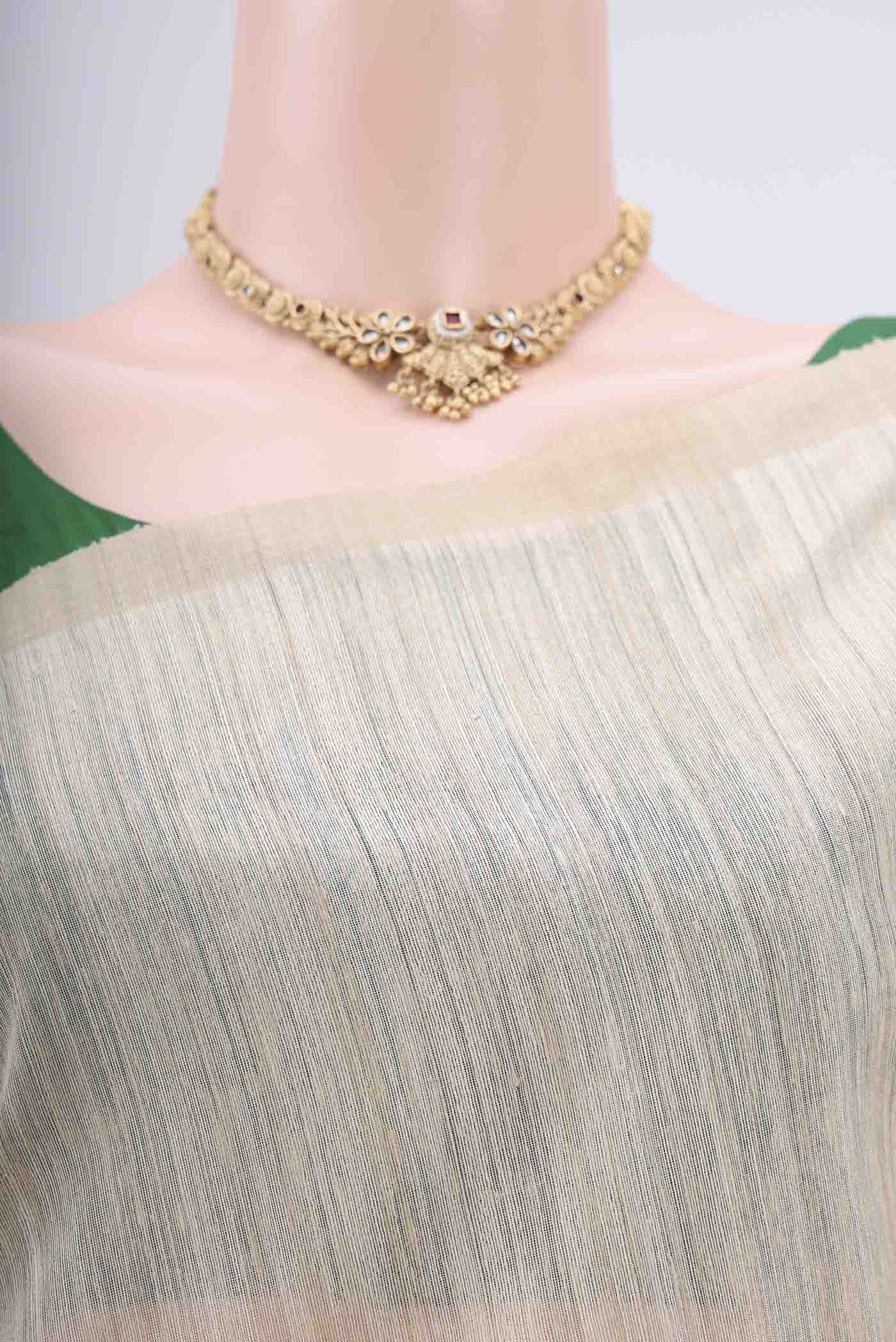 Border image of Beige Tussar Saree with Jamdani on the body and Thread Border. 