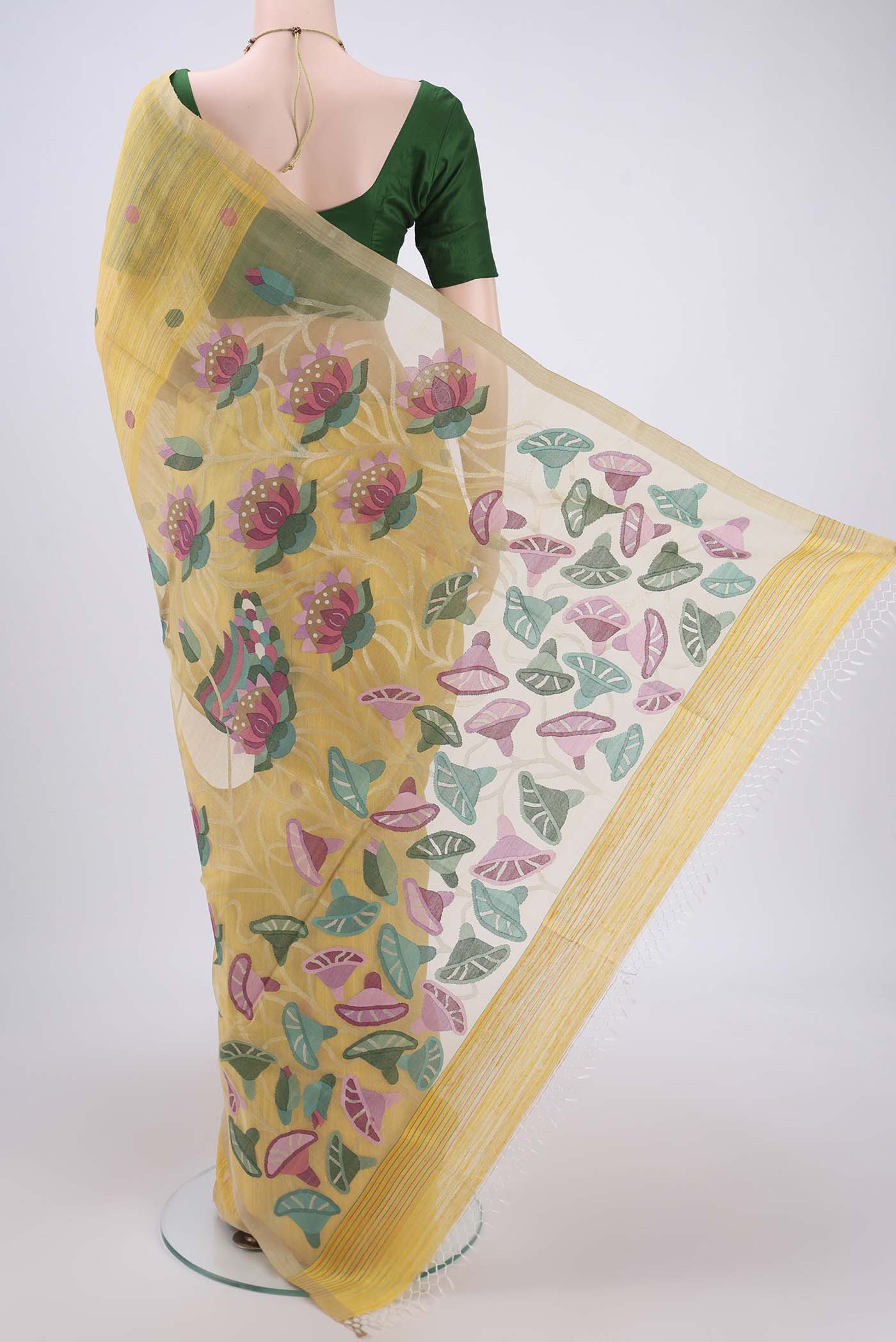 Flat view of Yellow Tussar Saree with Jamdani on the body and Thread Border. 