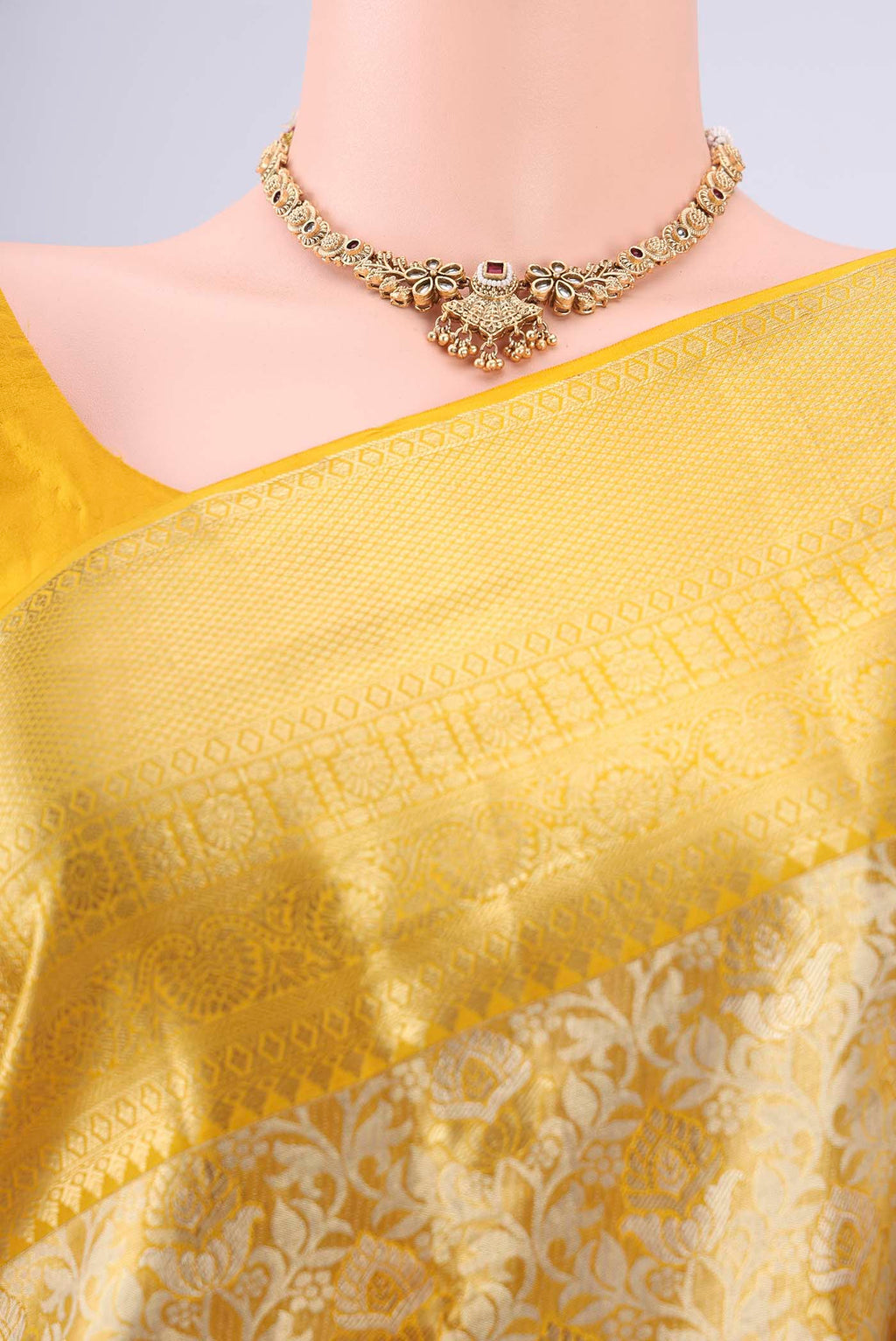 Border image of Lemon Yellow Dual Tone Kanjivaram Silk Saree with Zari Brocade on the body and Zari Border. 