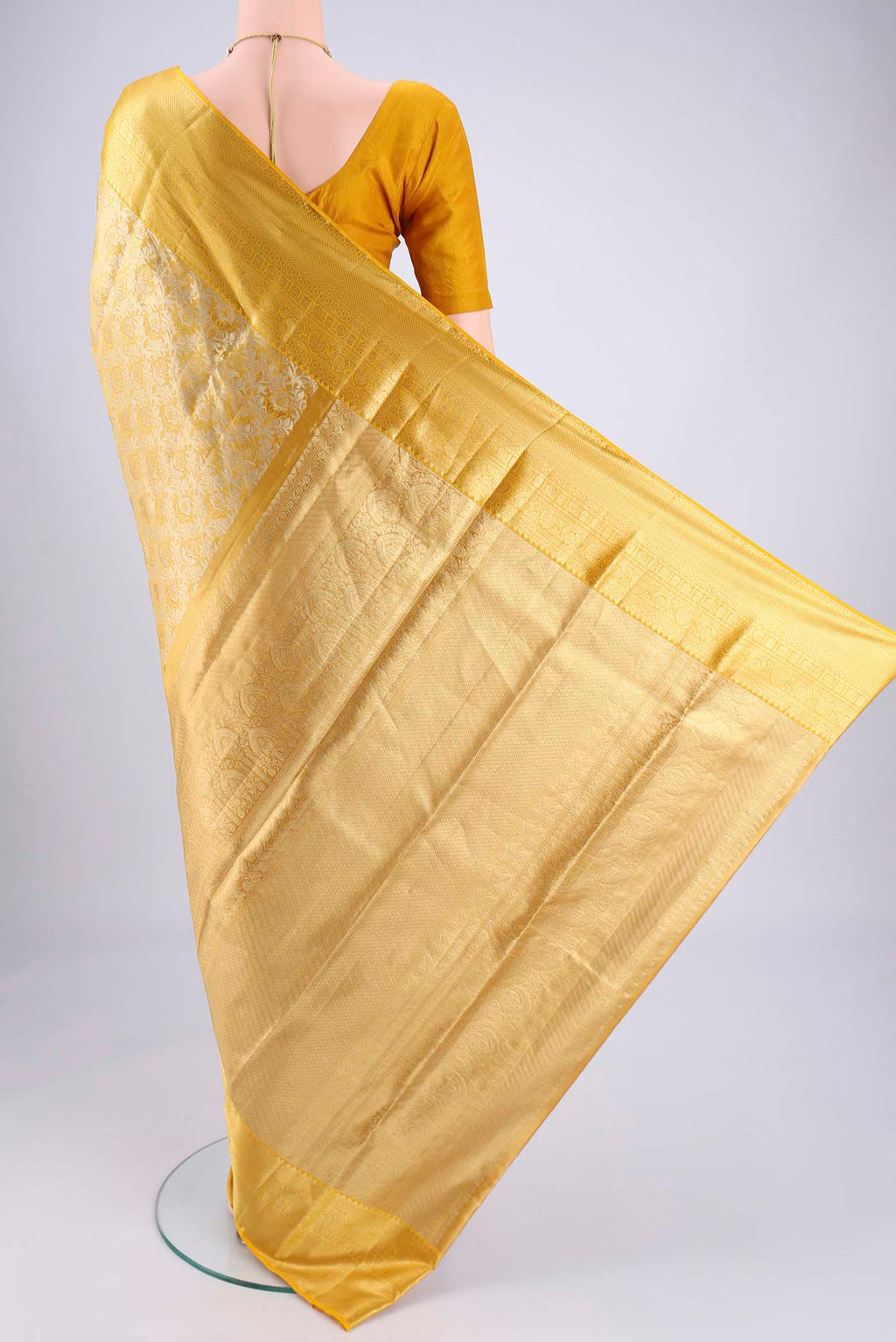 Flat view of Lemon Yellow Dual Tone Kanjivaram Silk Saree with Zari Brocade on the body and Zari Border. 