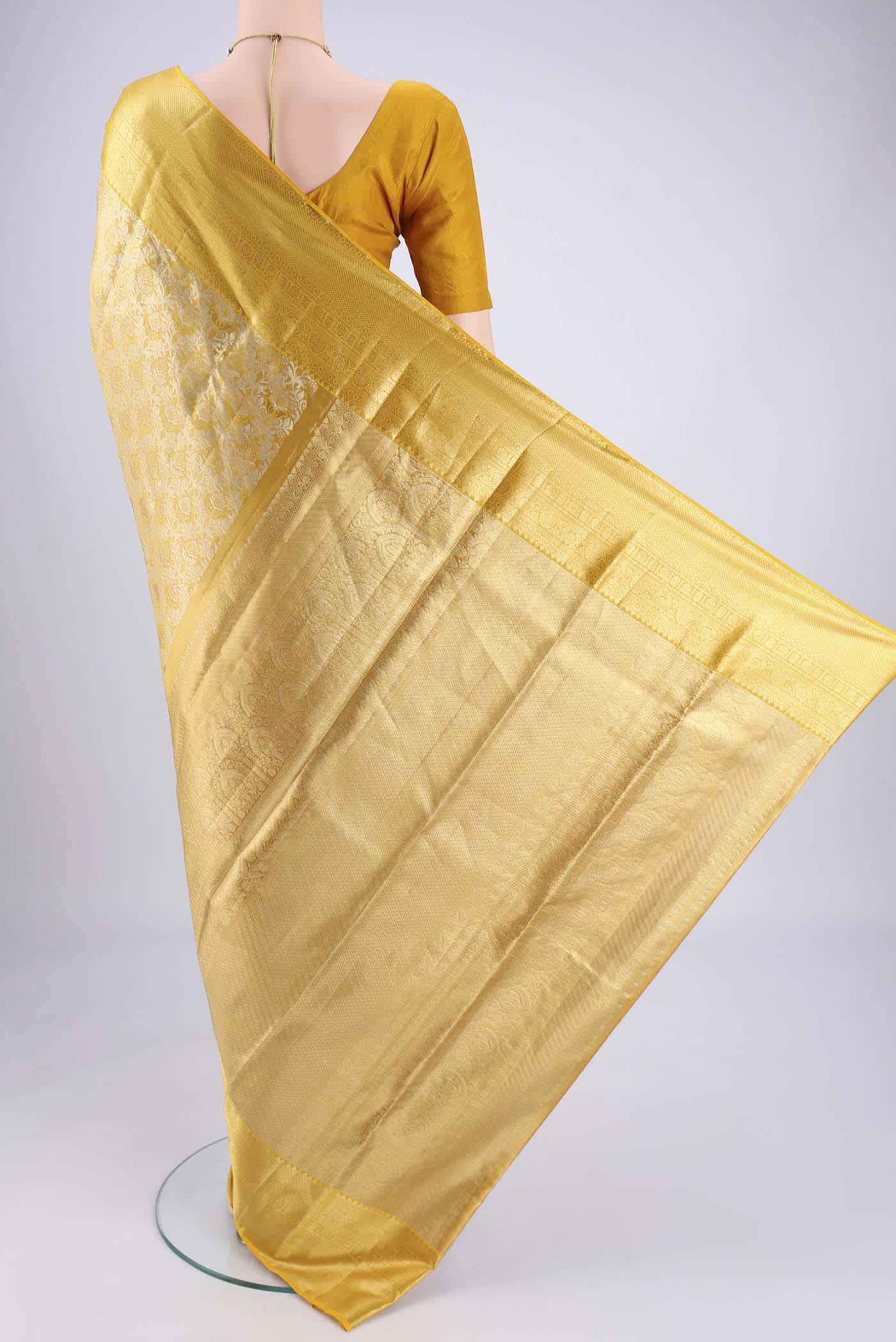 Flat view of Lemon Yellow Dual Tone Kanjivaram Silk Saree with Zari Brocade on the body and Zari Border. 