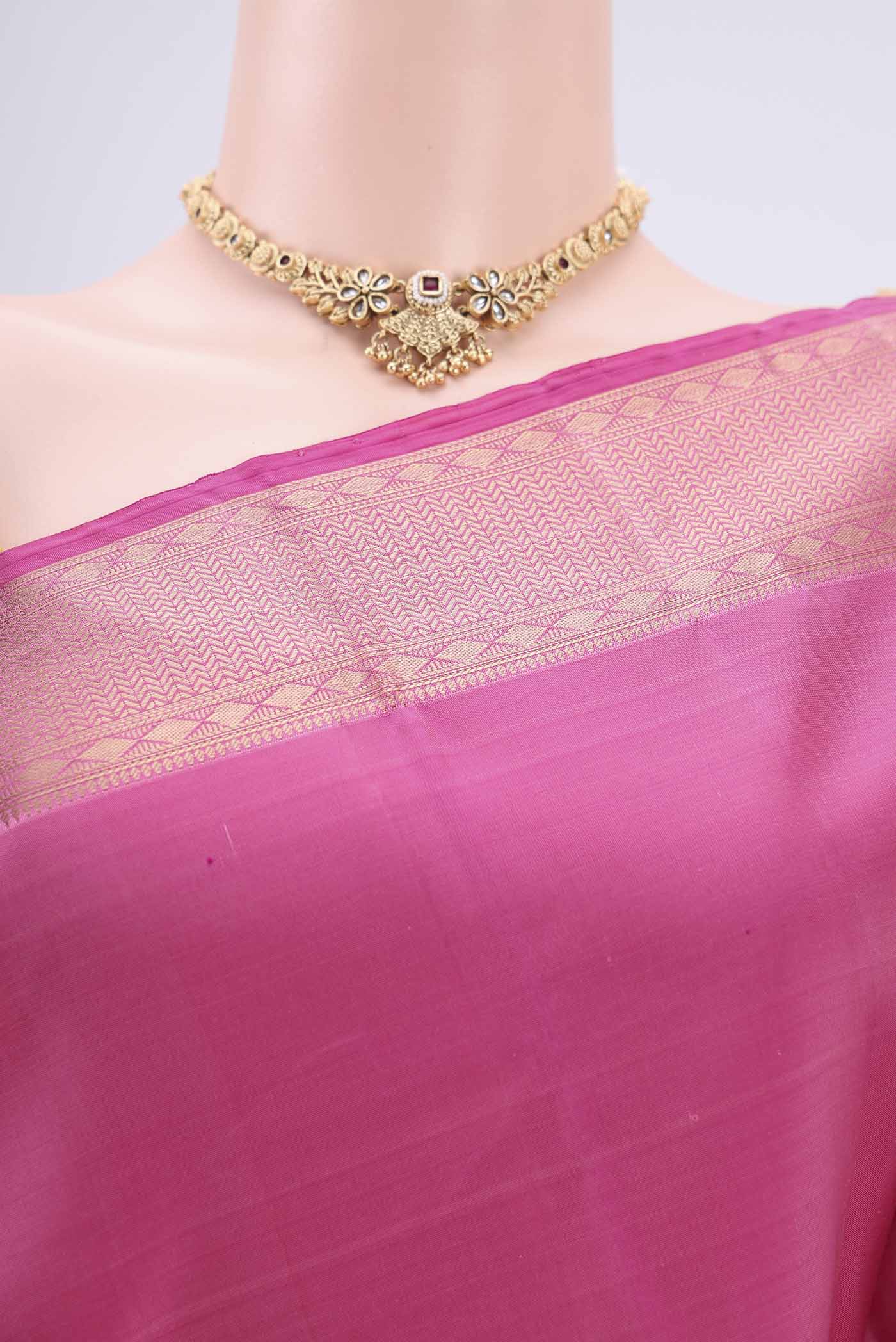 Border image of Pink Dual Tone Soft Silk Saree with Zari Butta on the body and Zari Border. 