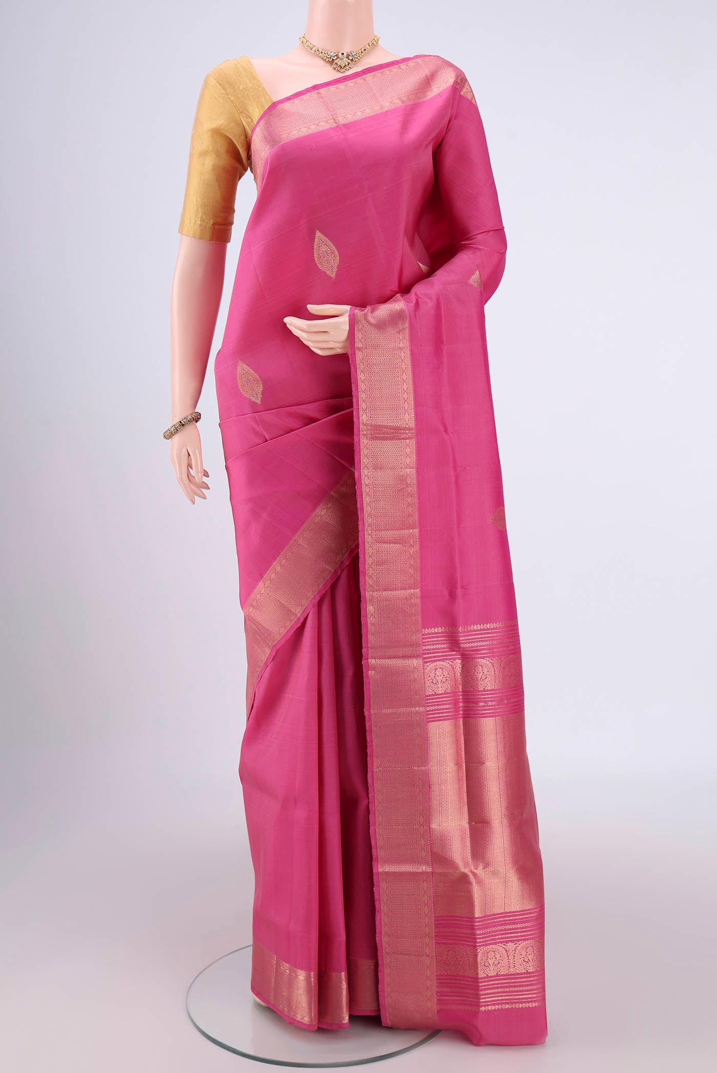 Pink Dual Tone Soft Silk Saree with Zari Butta on the body and Zari Border.  displayed on a mannequin
