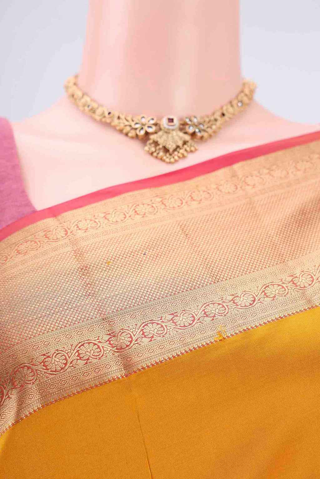 Border image of Mustard Soft Silk Saree with Plain Body and Zari Border. 