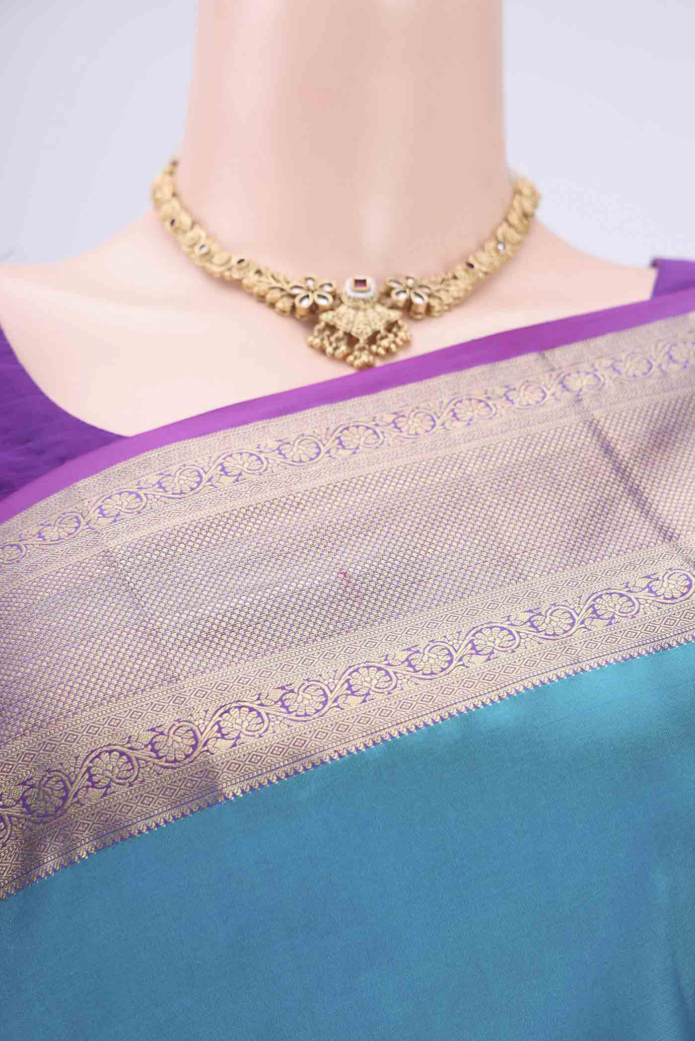 Border image of Blue Soft Silk Saree with Plain Body and Zari Border. 