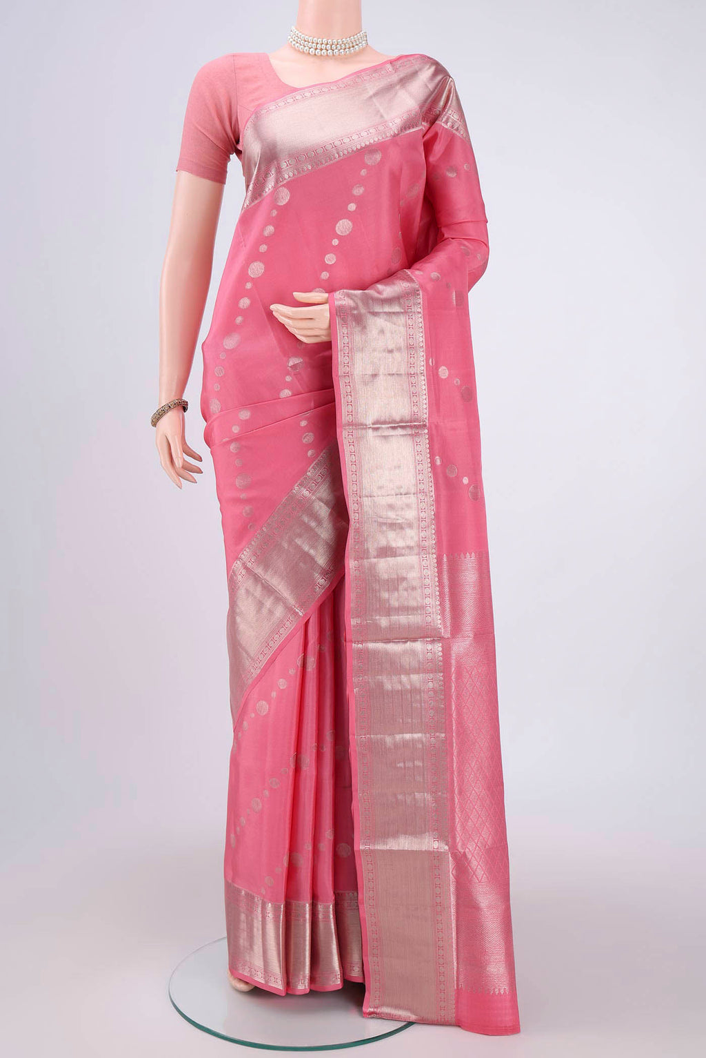 Rose pink Dual Tone Soft Silk Saree with Zari Butta on the body and Zari Border.  displayed on a mannequin