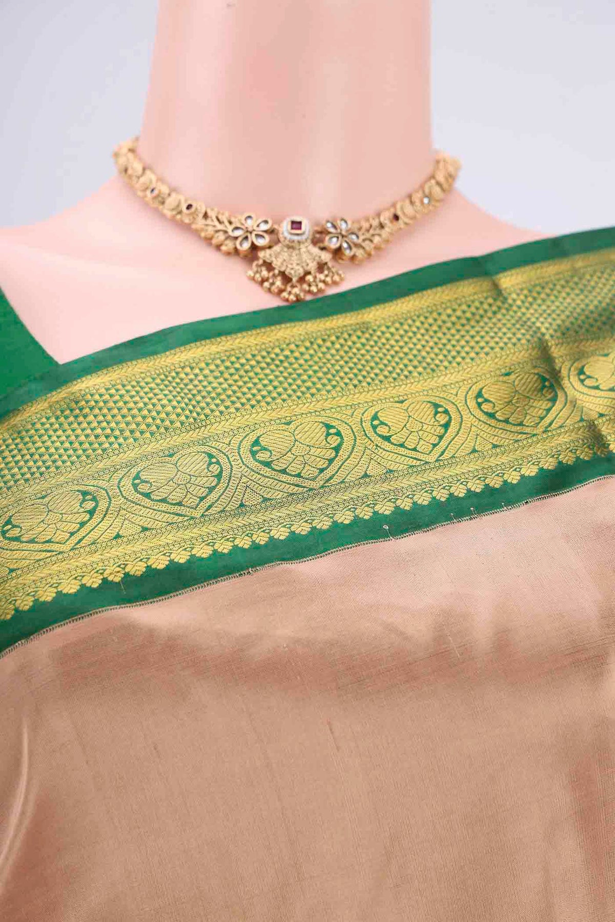 Border image of Beige Kanjivaram Silk Saree with Plain Body and Zari Border. 