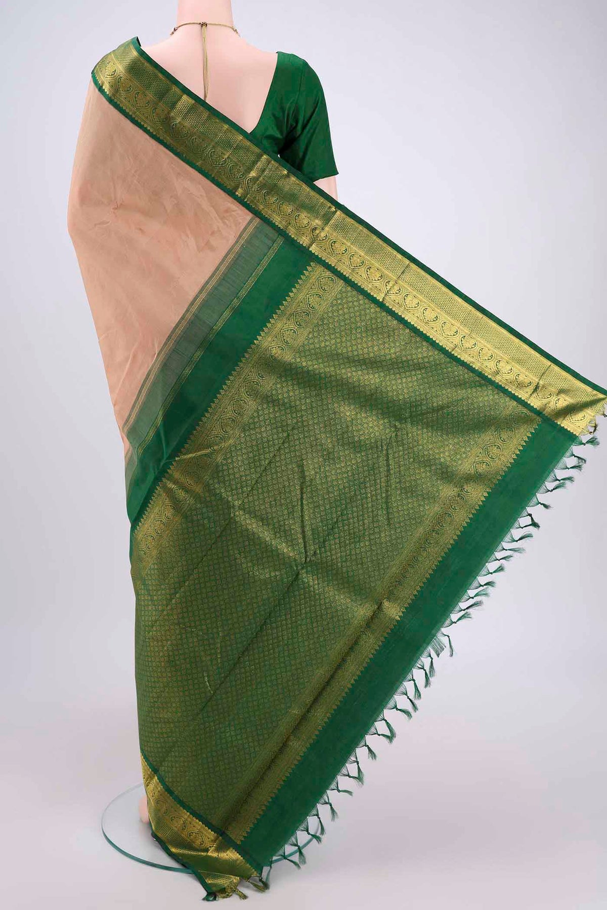 Flat view of Beige Kanjivaram Silk Saree with Plain Body and Zari Border. 