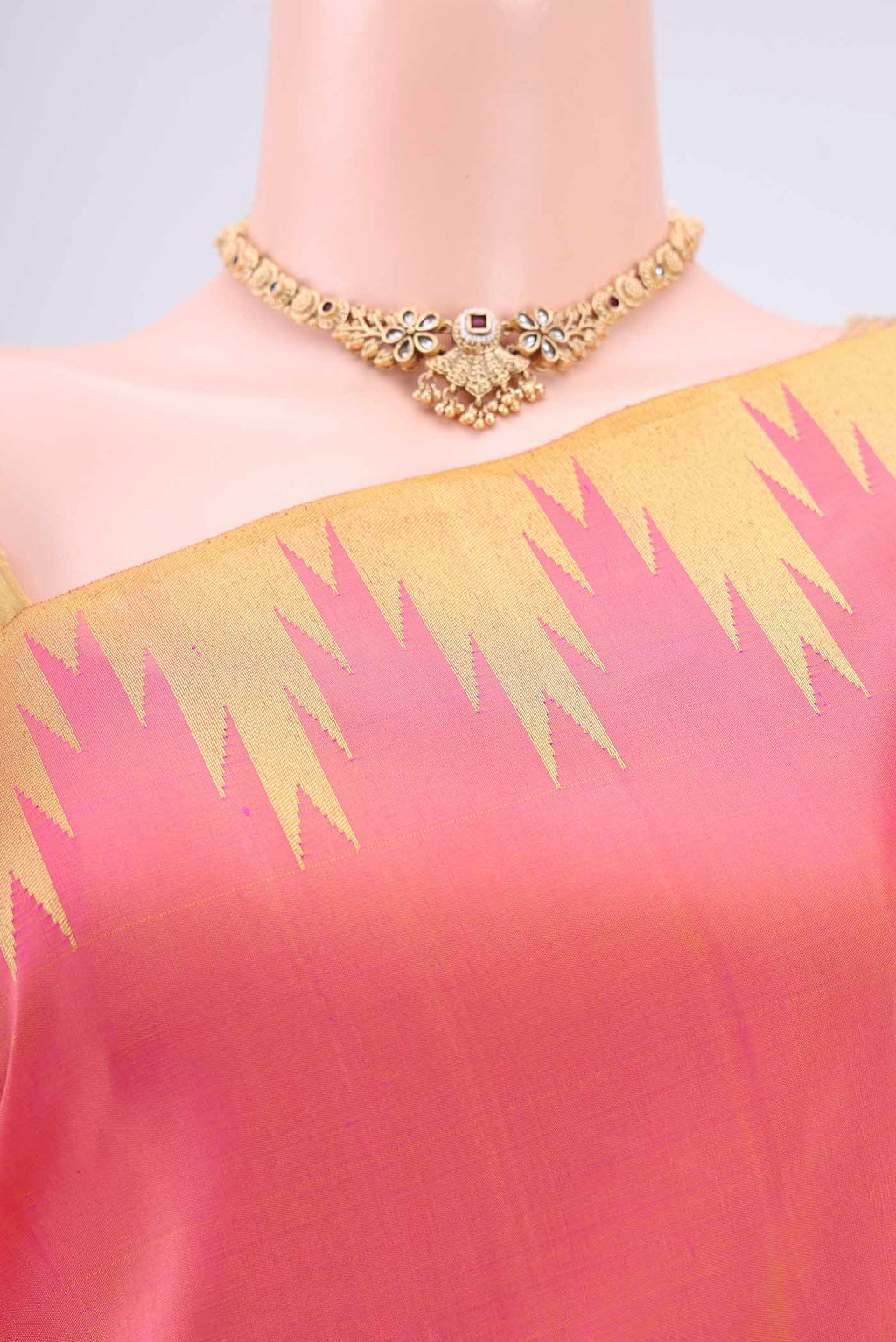 Border image of Pure Silk Pure Zari Pinkish Yellow Kanchipuram Saree with Zari Butta on the body and Zari Border. 