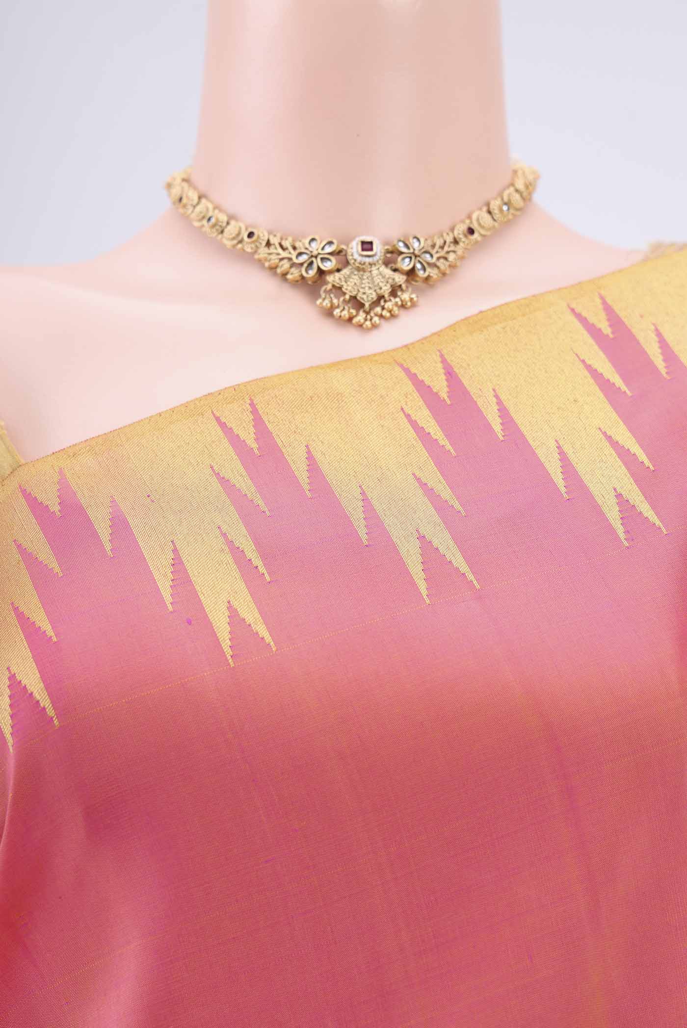 Border image of Pure Silk Pure Zari Pinkish Yellow Kanchipuram Saree with Zari Butta on the body and Zari Border. 