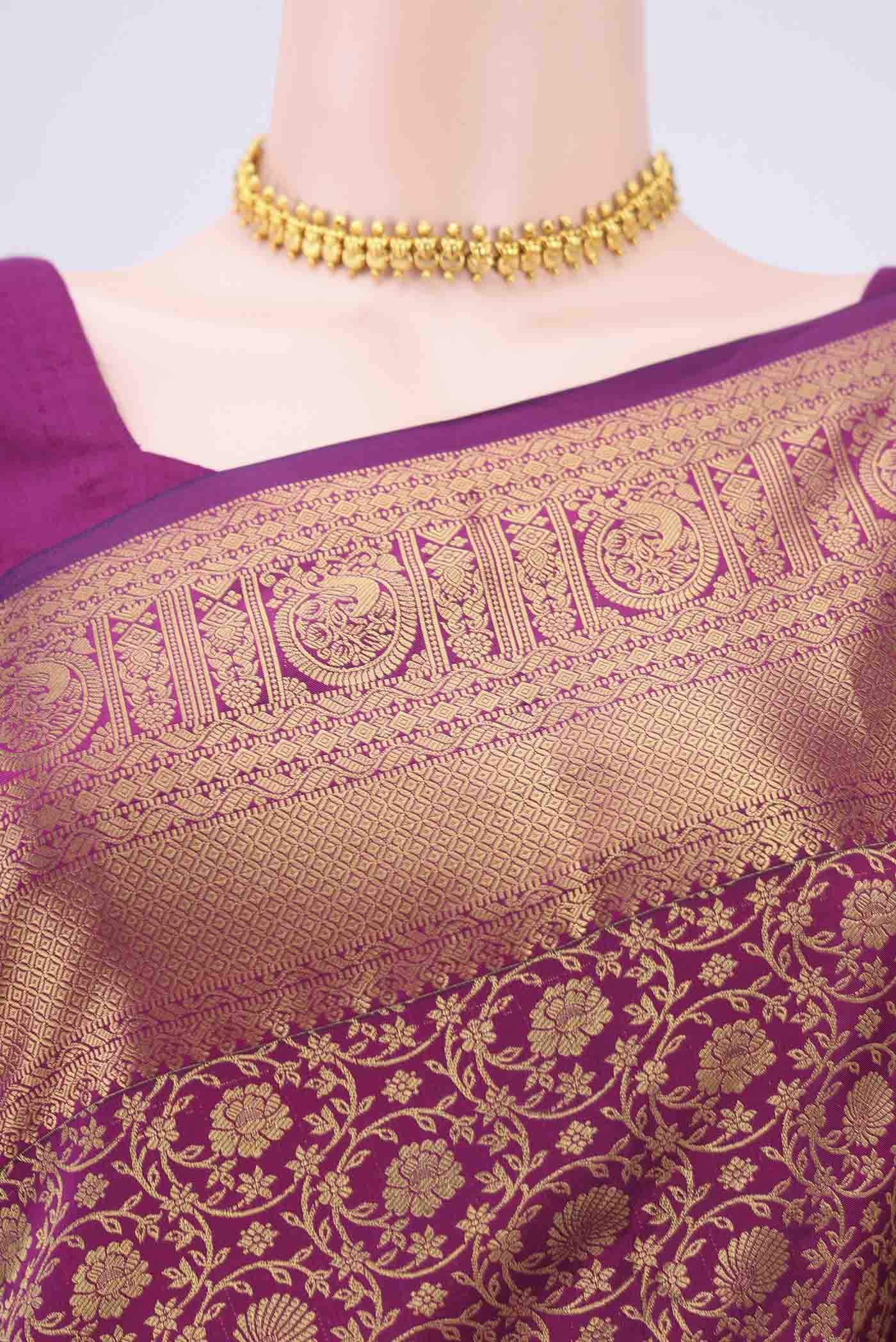 Border image of Magenta Kanjivaram Silk Saree with Zari Butta on the body and Zari Border. 
