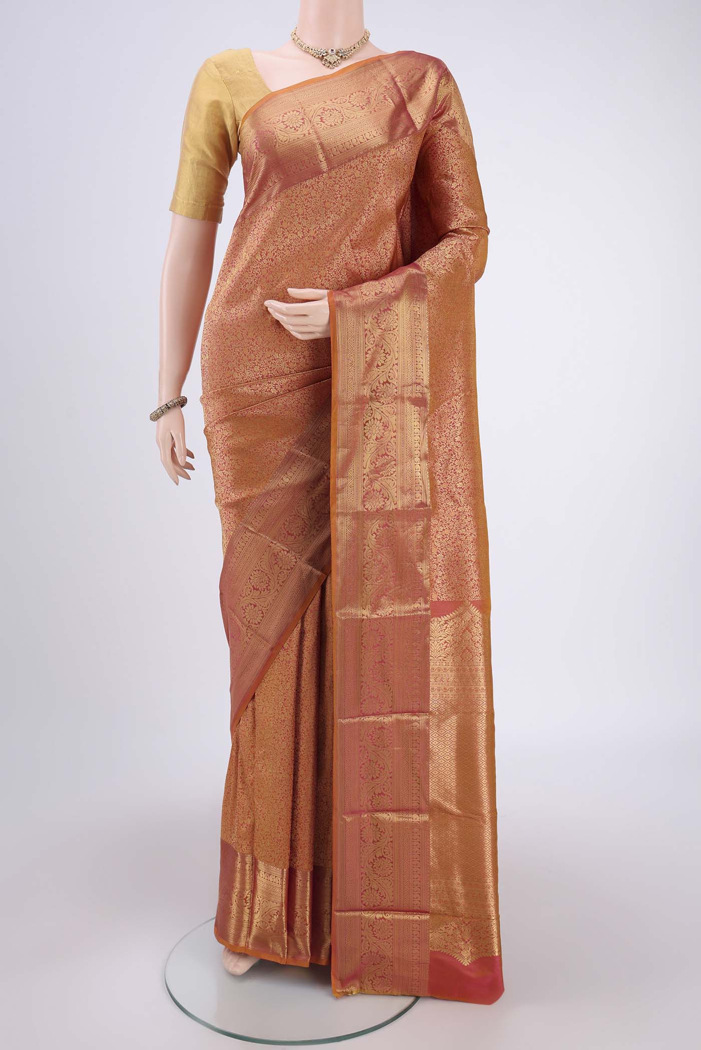 Mustard Bangalore Silk Saree with Zari Brocade on the body and Zari Border.  displayed on a mannequin
