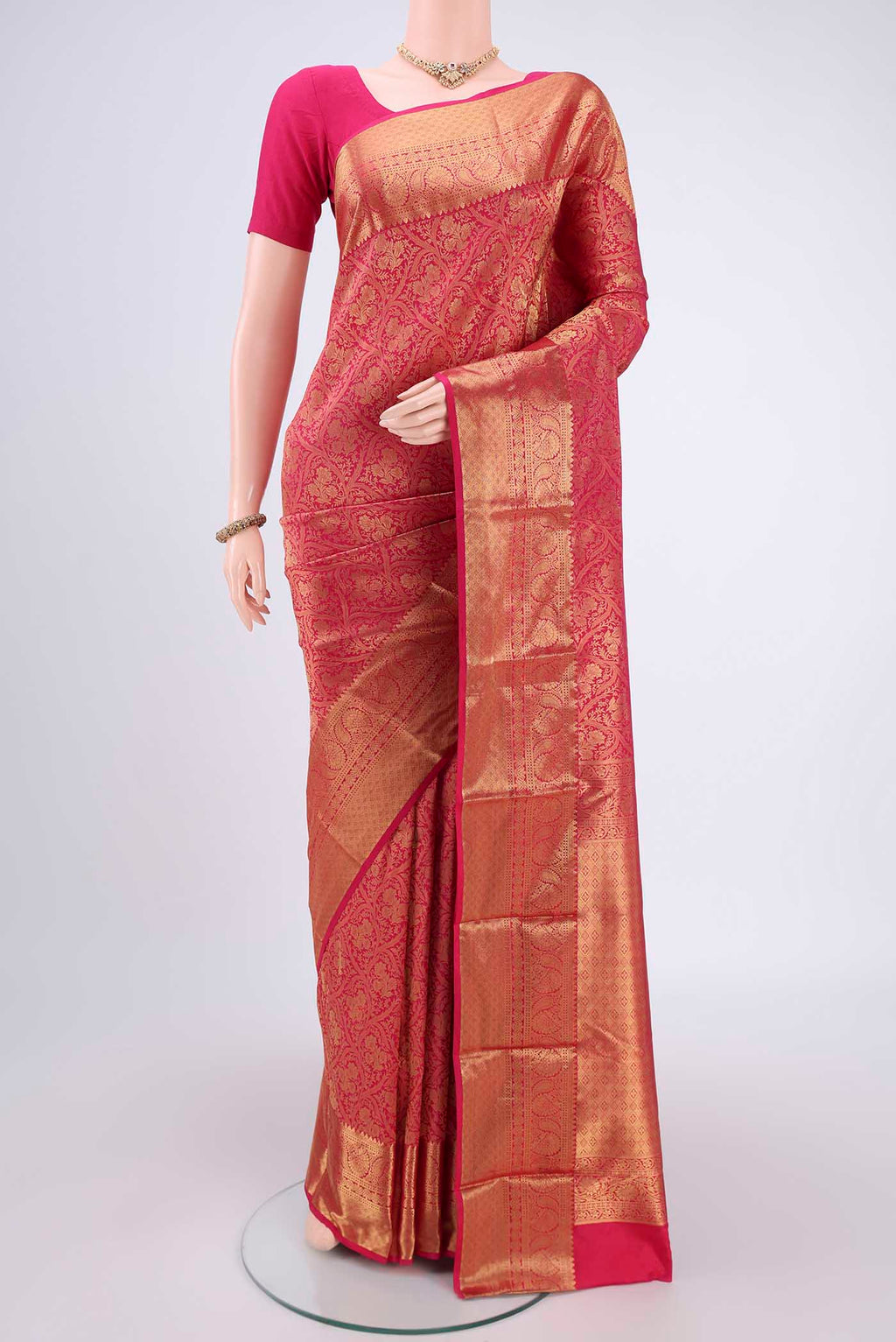 Rani Pink Dual Tone Bangalore Silk Saree with Zari Brocade on the body and Zari Border.  displayed on a mannequin
