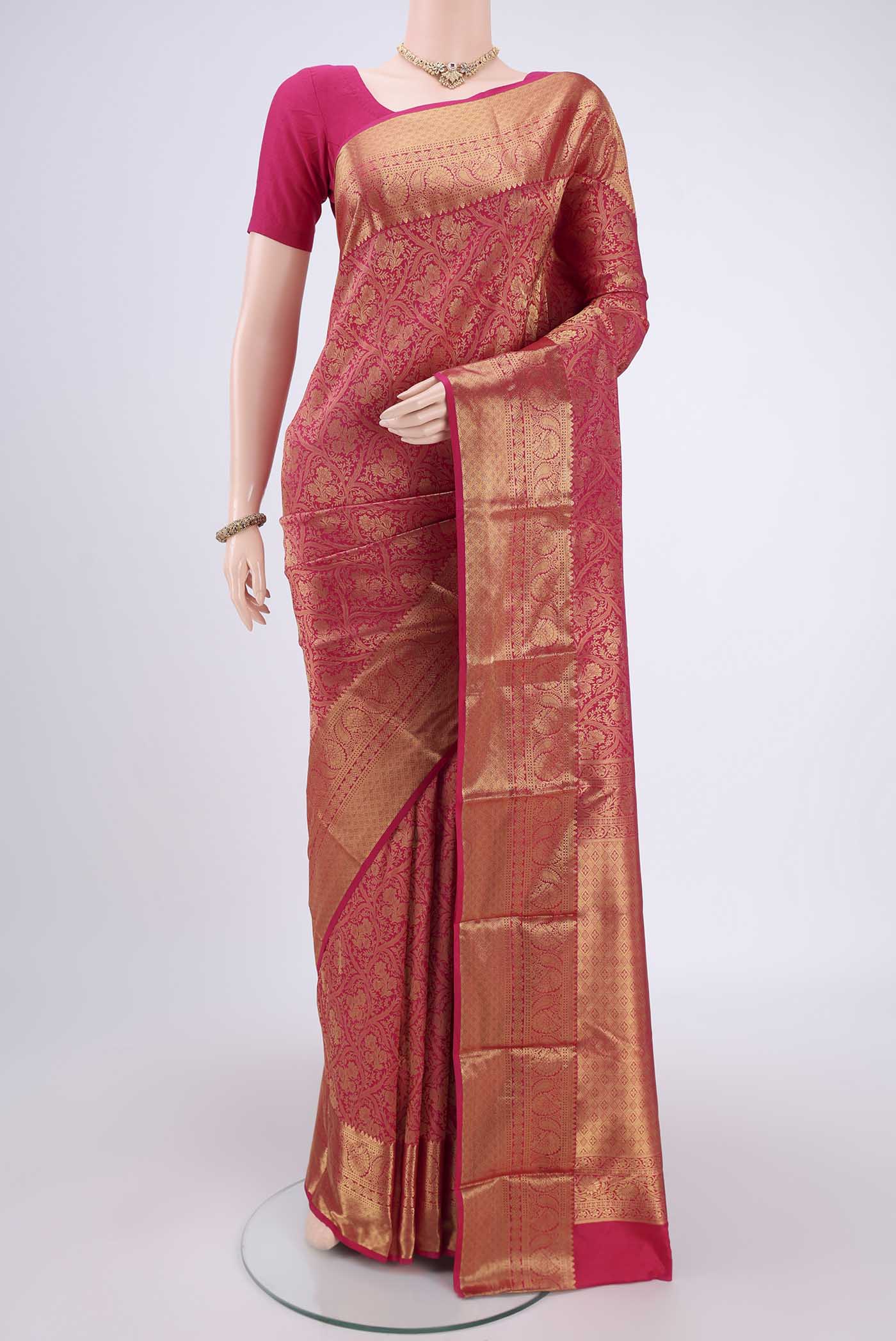 Rani Pink Dual Tone Bangalore Silk Saree with Zari Brocade on the body and Zari Border.  displayed on a mannequin
