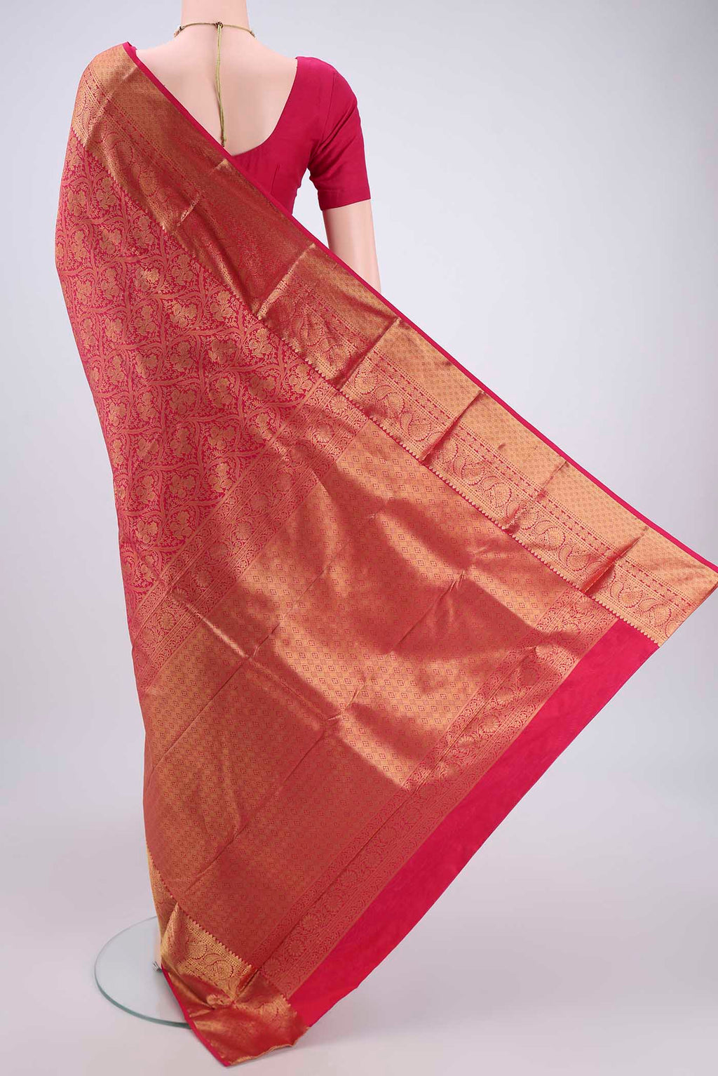 Flat view of Rani Pink Dual Tone Bangalore Silk Saree with Zari Brocade on the body and Zari Border. 