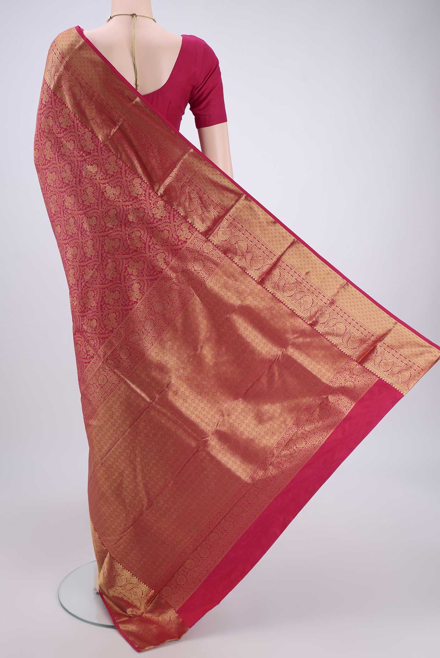 Flat view of Rani Pink Dual Tone Bangalore Silk Saree with Zari Brocade on the body and Zari Border. 