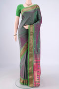 Green Dual Tone Paithani Silk Saree with Zari Butta on the body and Zari Border.  displayed on a mannequin