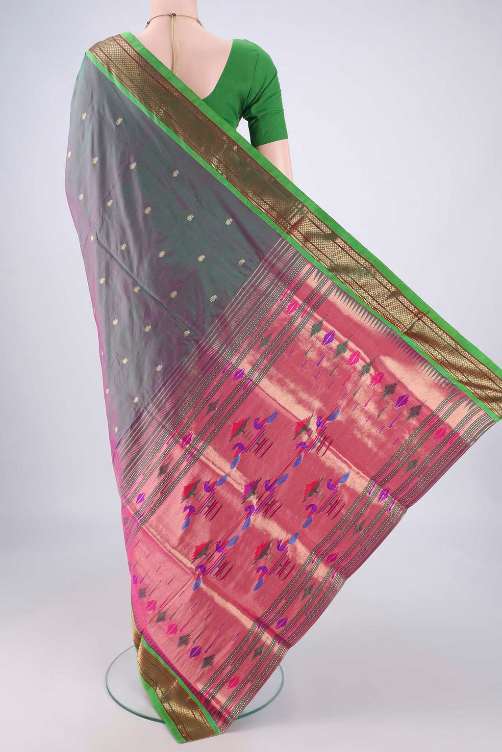 Flat view of Green Dual Tone Paithani Silk Saree with Zari Butta on the body and Zari Border. 