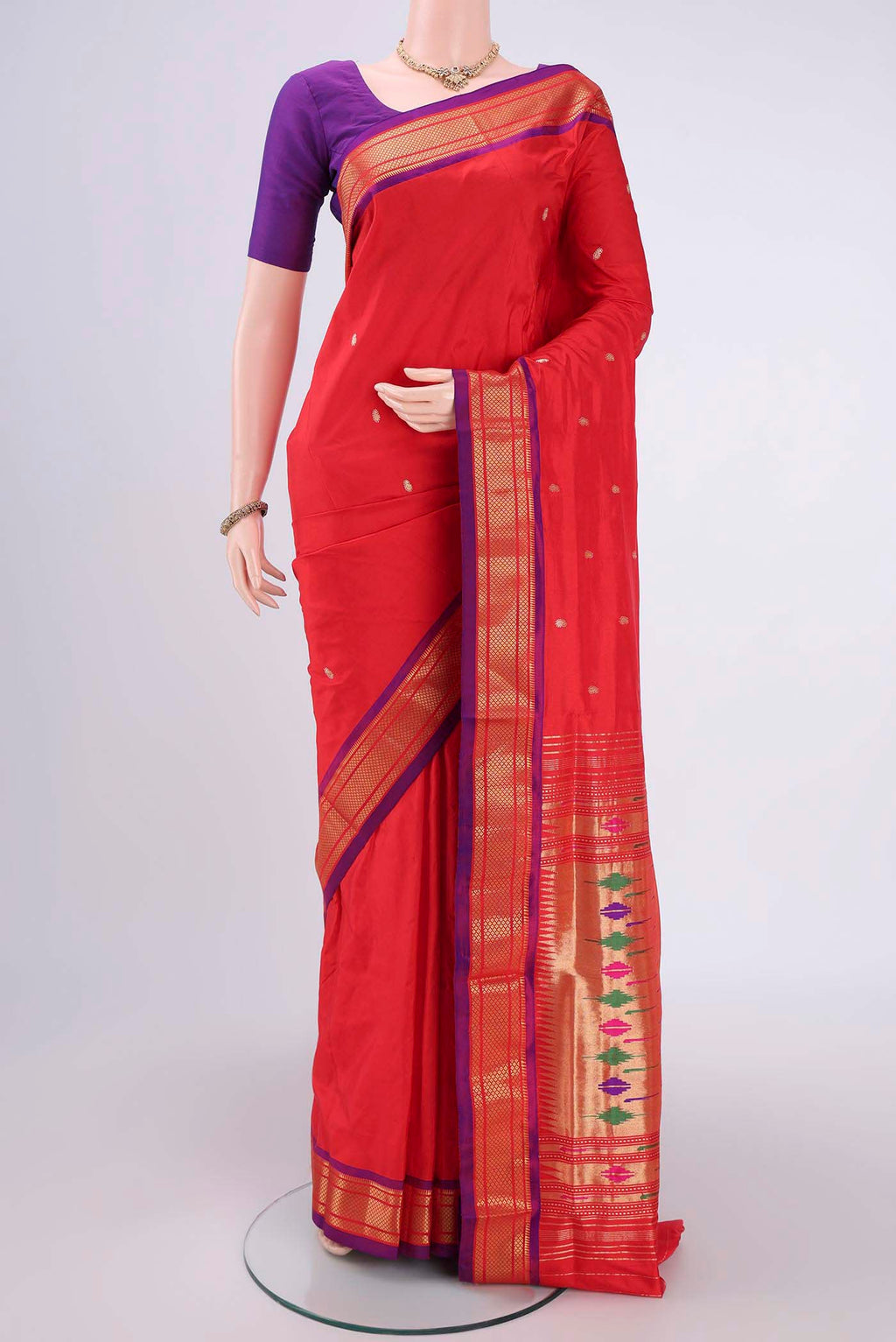 Red Paithani Silk Saree with Zari Butta on the body and Zari Border.  displayed on a mannequin