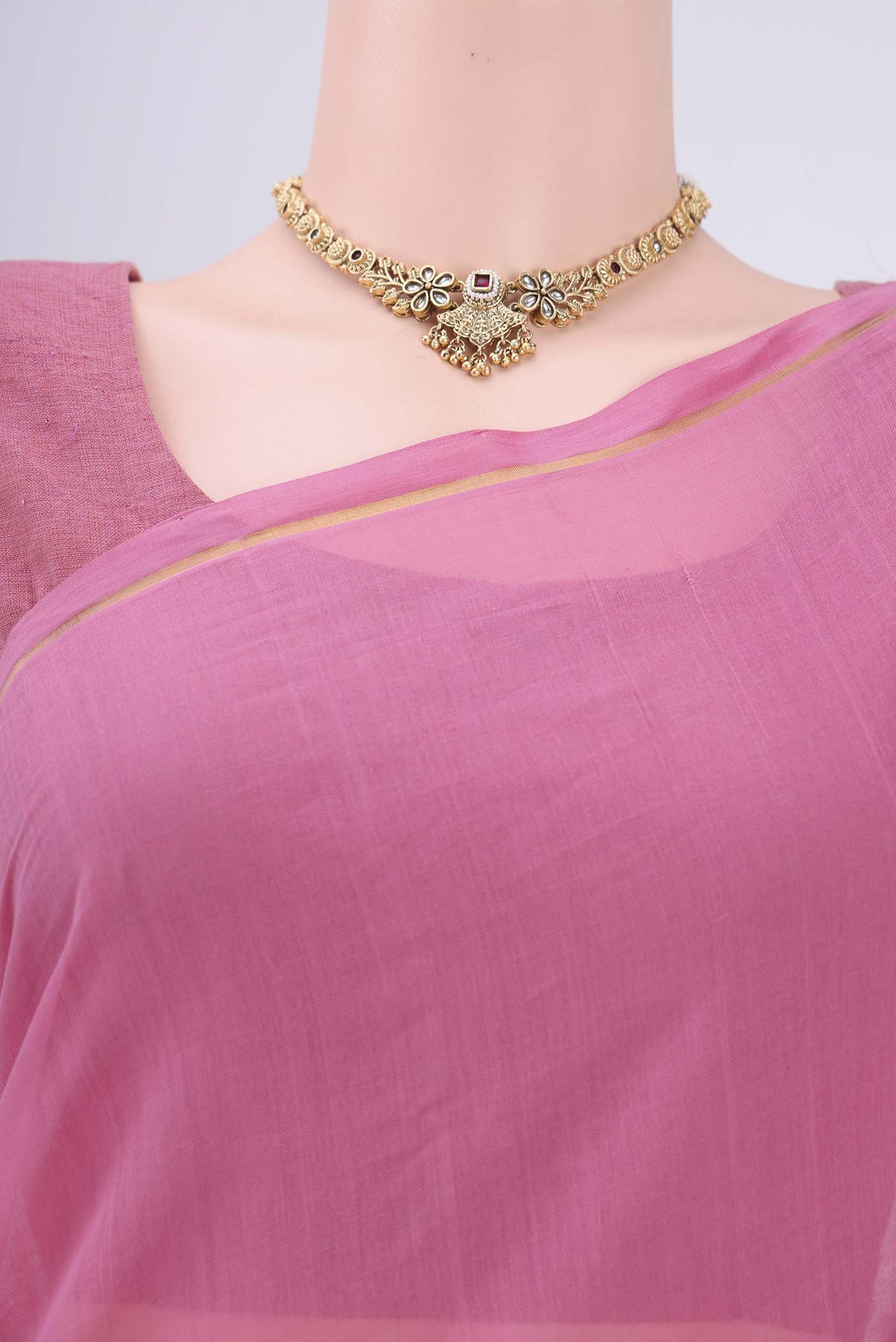 Border image of Pink Cotton Saree with Zari Butta on the body and Zari Border. 