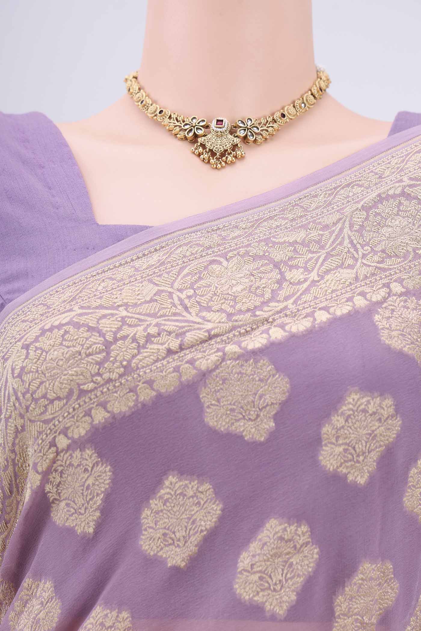 Border image of Mauve Banarasi Georgette Saree with Zari Butta on the body and Zari Border. 