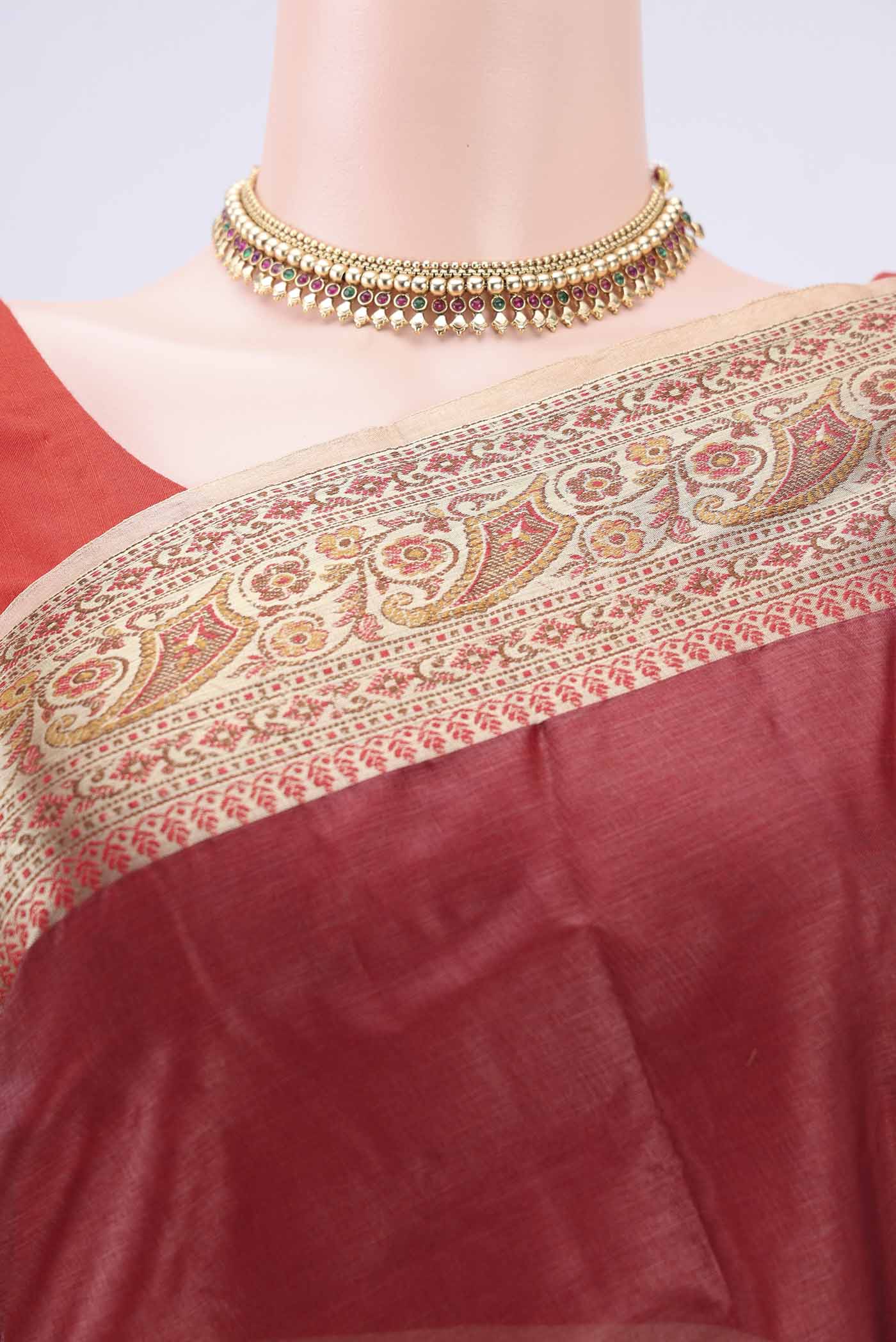 Border image of Brown Banarasi Tussar Silk Saree with Zari Butta on the body and Zari And Thread Border. 