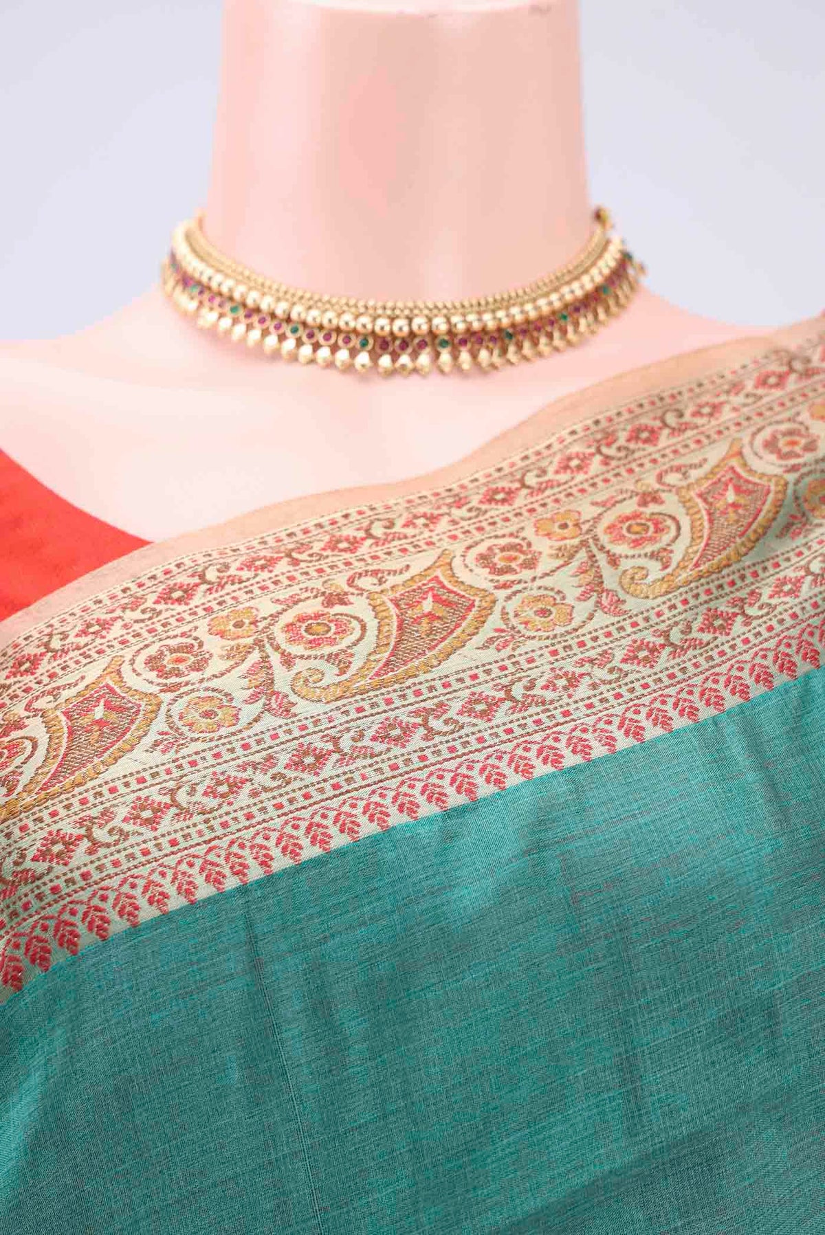 Border image of Green Banarasi Tussar Silk Saree with Zari Butta on the body and Zari And Thread Border. 
