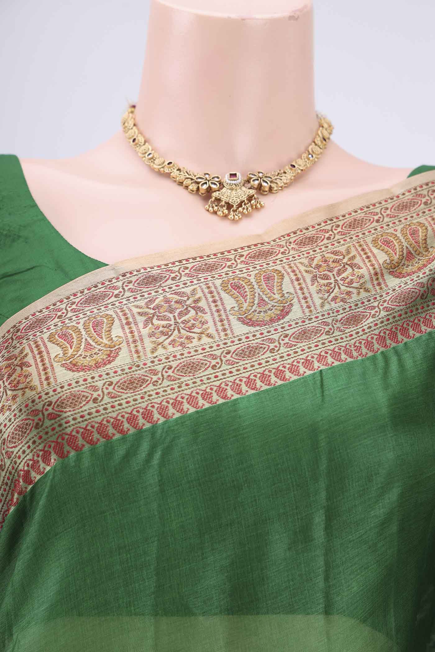 Border image of Green Banarasi Tussar Silk Saree with Plain Body and Zari And Thread Border. 