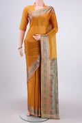 Mustard Banarasi Tussar Silk Saree with Plain Body and Zari And Thread Border.  displayed on a mannequin