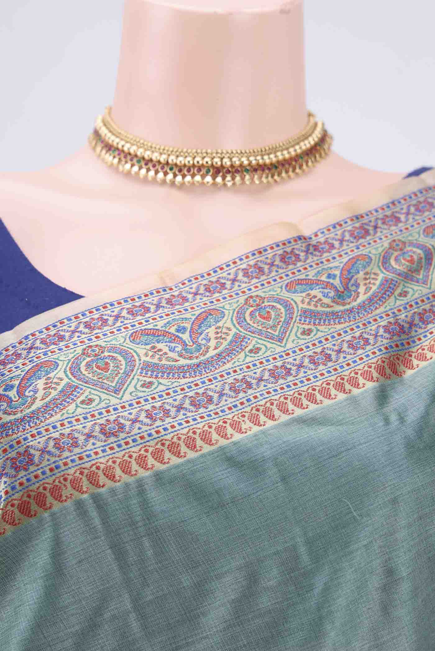 Border image of Sea Green Banarasi Tussar Silk Saree with Zari Butta on the body and Zari And Thread Border. 