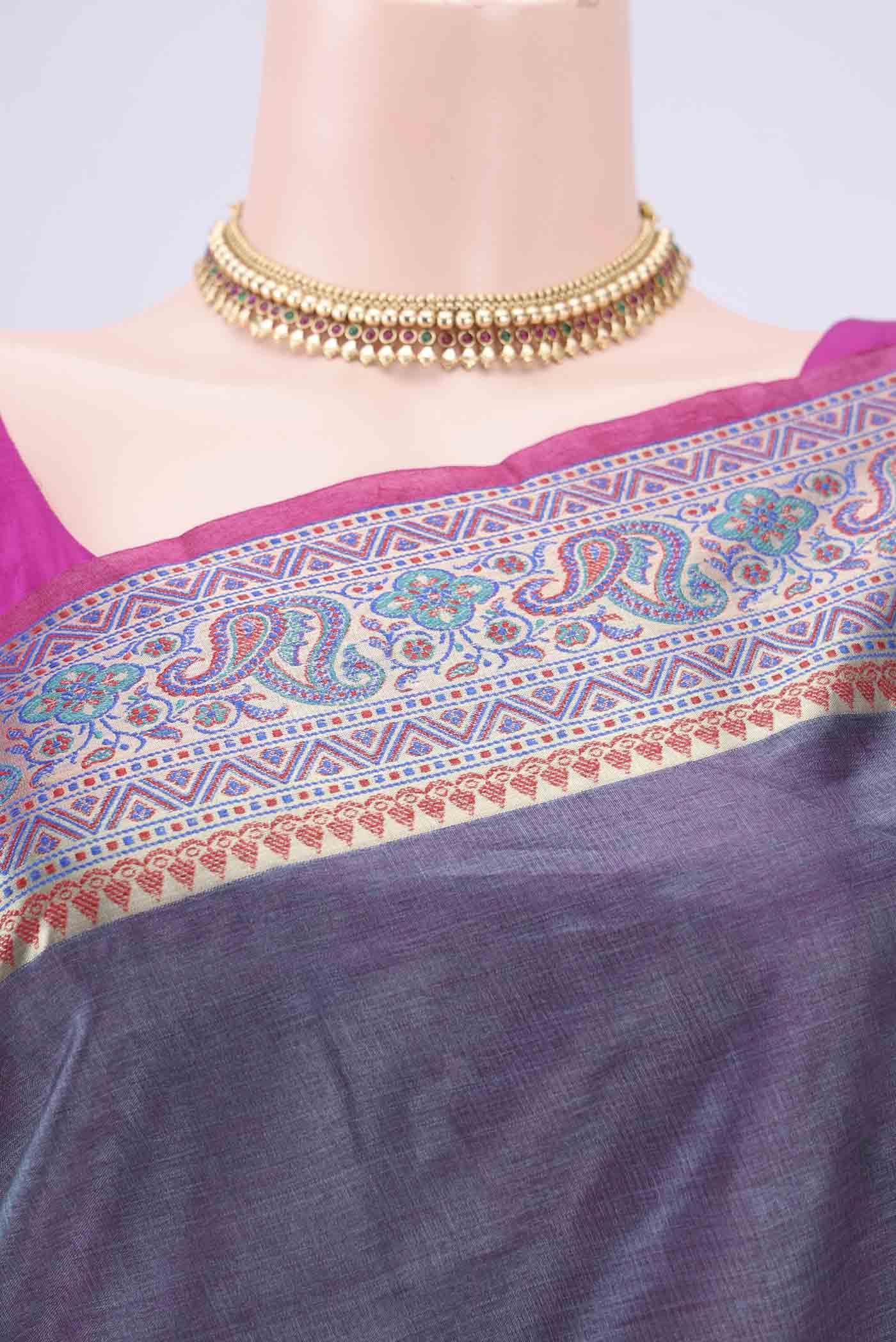 Border image of Grey Banarasi Tussar Silk Saree with Zari Butta on the body and Zari And Thread Border. 
