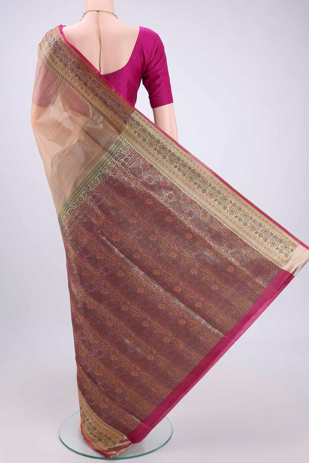 Flat view of Beige Banarasi Tussar Silk Saree with Zari Butta on the body and Zari And Thread Border. 
