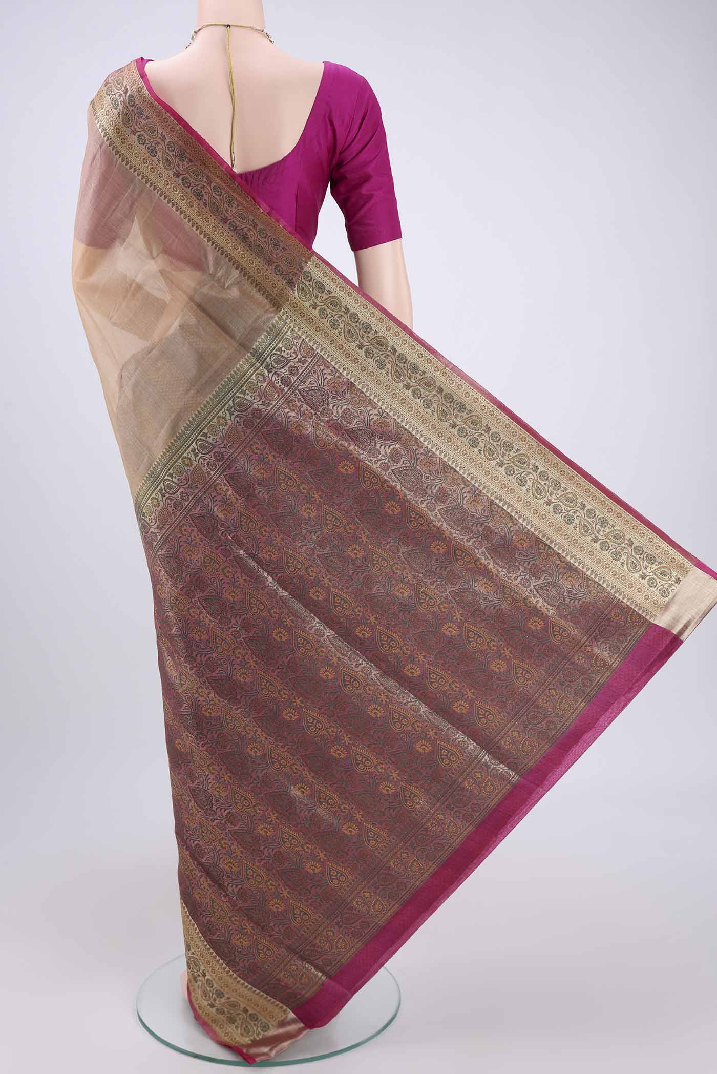 Flat view of Beige Banarasi Tussar Silk Saree with Zari Butta on the body and Zari And Thread Border. 