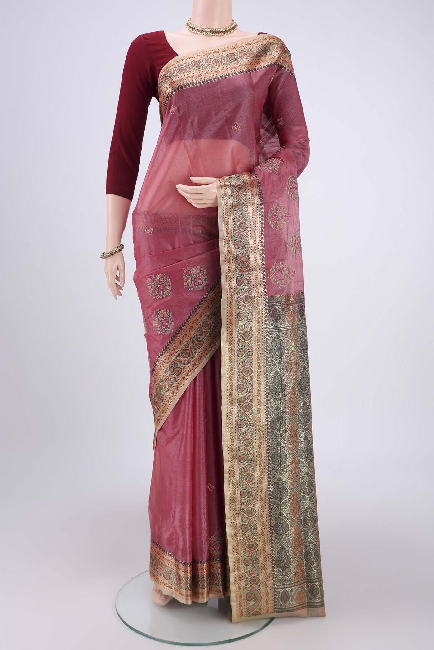 Rose pink Banarasi Tussar Silk Saree with Zari Butta on the body and Zari And Thread Border.  displayed on a mannequin