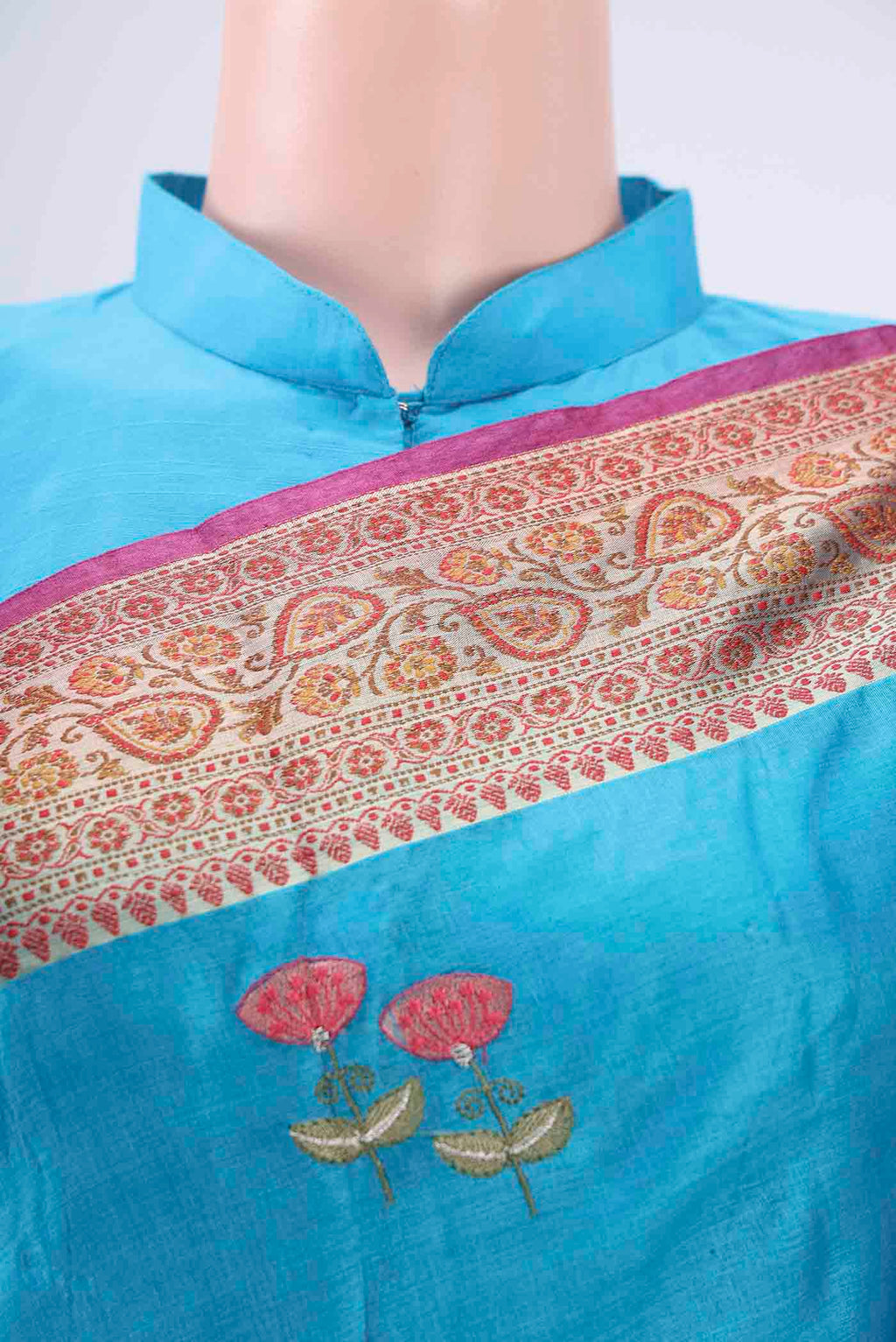 Border image of Blue Banarasi Tussar Silk Saree with Embroidery on the body and Zari And Thread Border. 