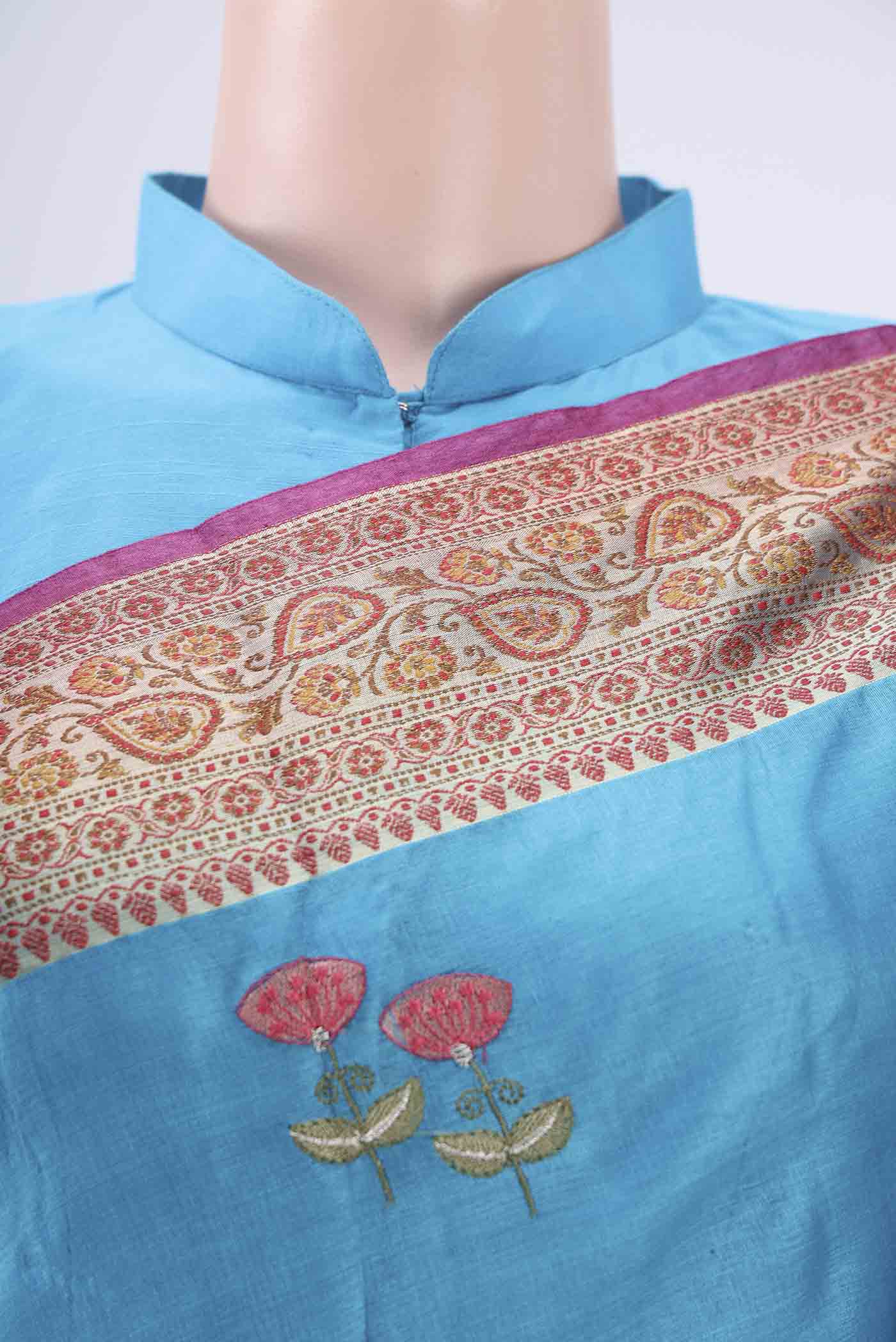 Border image of Blue Banarasi Tussar Silk Saree with Embroidery on the body and Zari And Thread Border. 