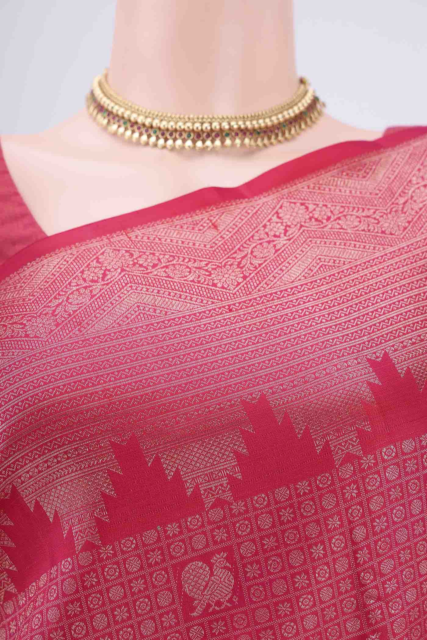 Border image of Pink Kanchipuram Silk Saree with Zari Butta on the body and Zari Border. 