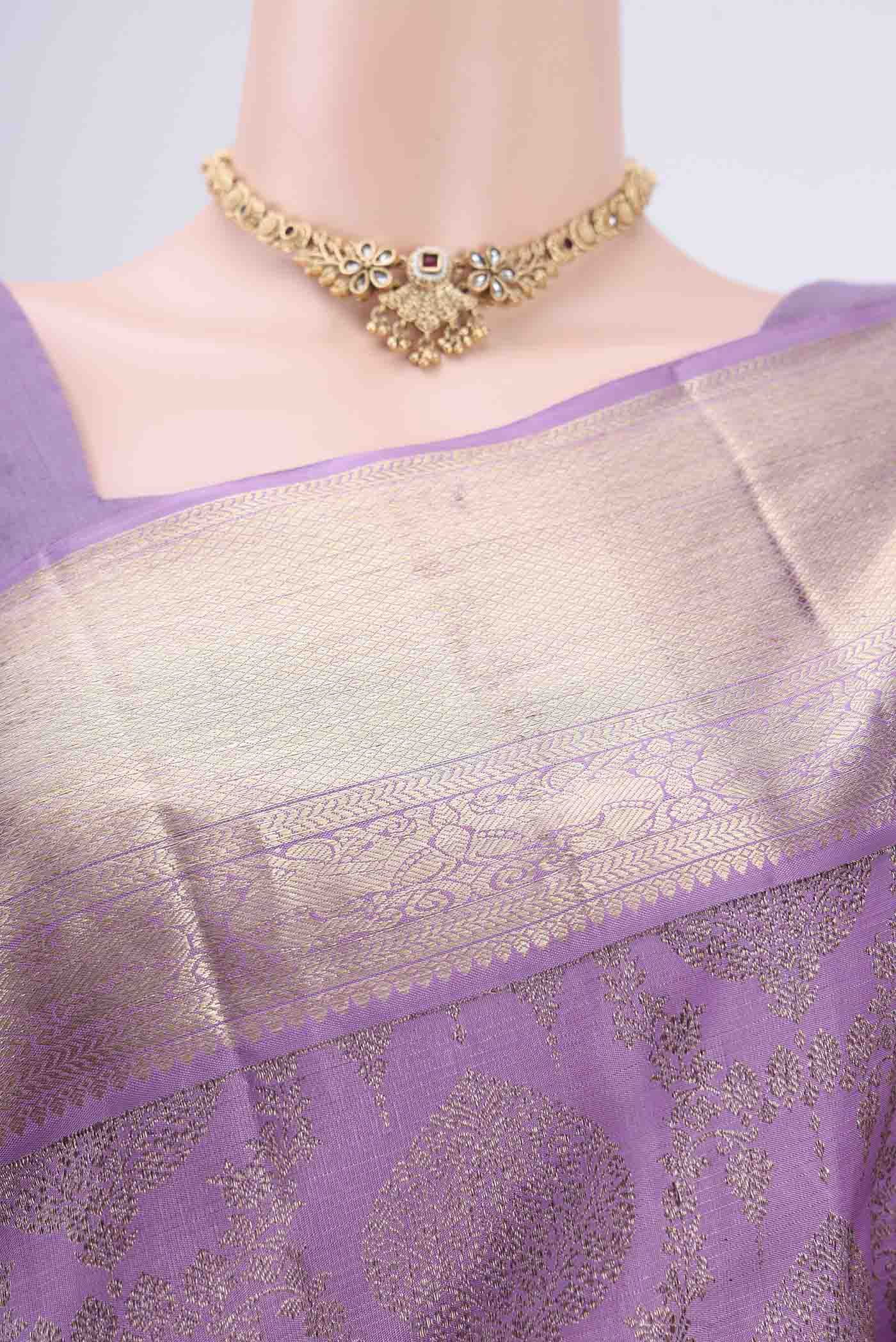 Border image of Lavender Kanchipuram Silk Saree with Zari Brocade on the body and Zari Border. 