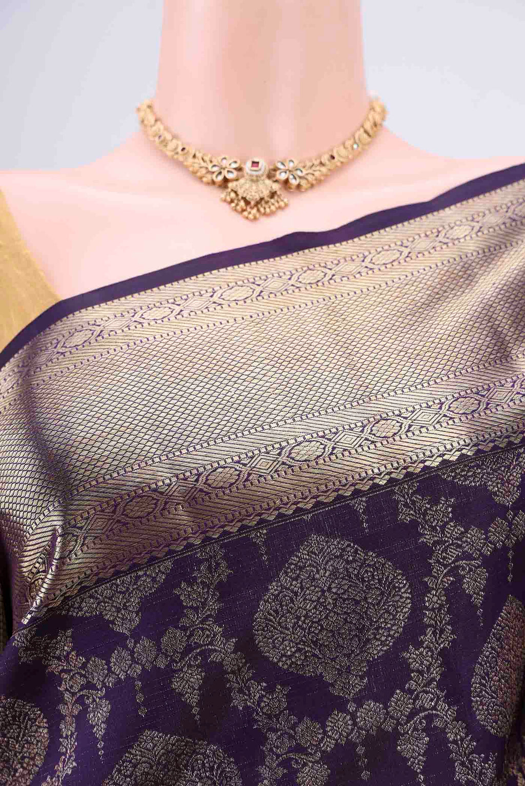Border image of Purple Kanchipuram Silk Saree with Zari Brocade on the body and Zari Border. 