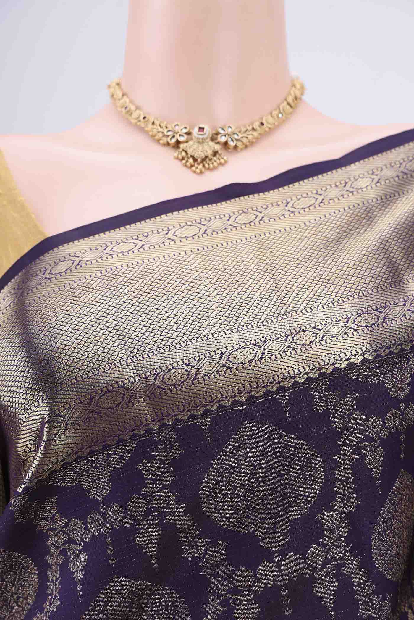 Border image of Purple Kanchipuram Silk Saree with Zari Brocade on the body and Zari Border. 