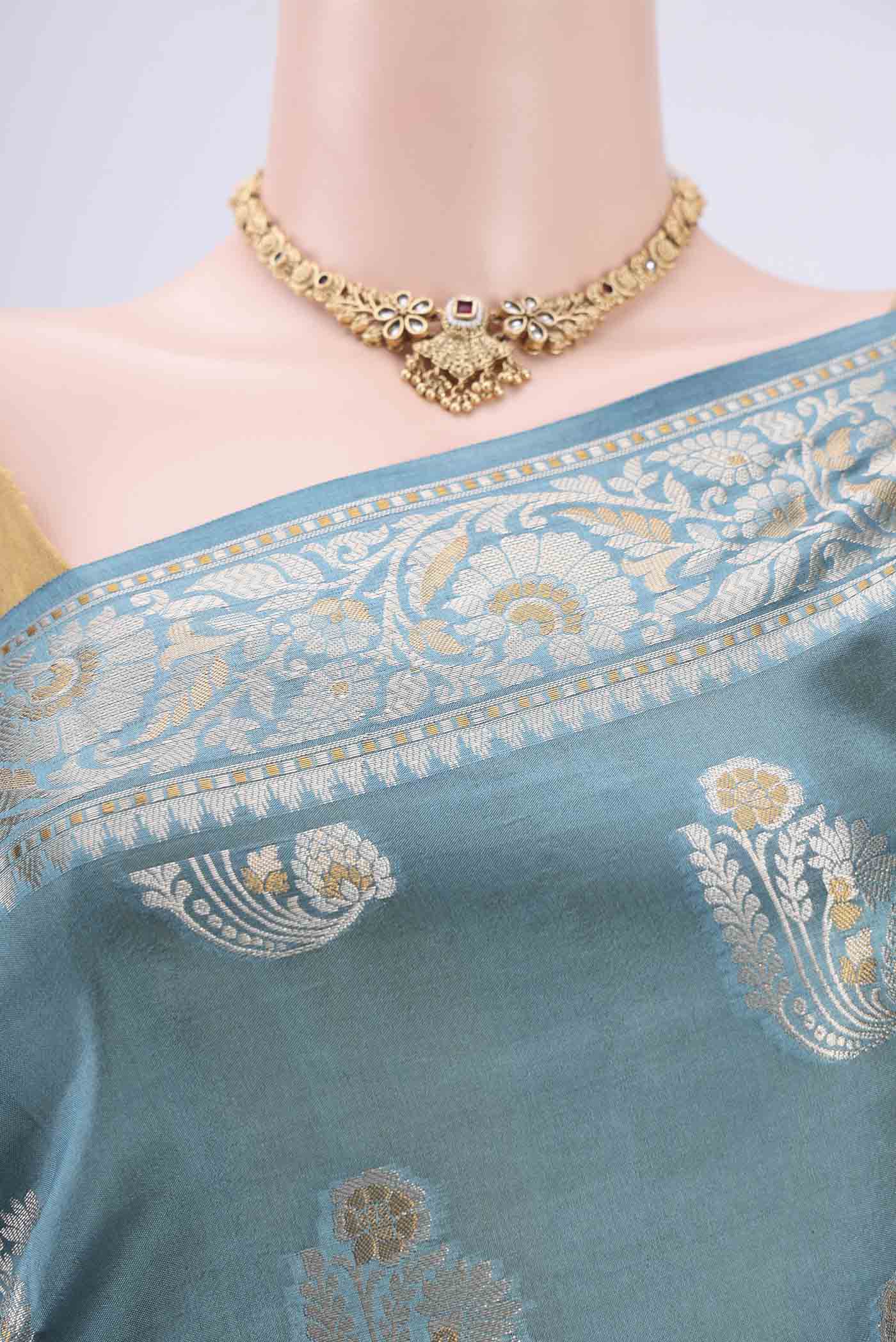 Border image of Sky Blue Banarasi Raw Silk Saree with Zari Butta on the body and Zari Border. 