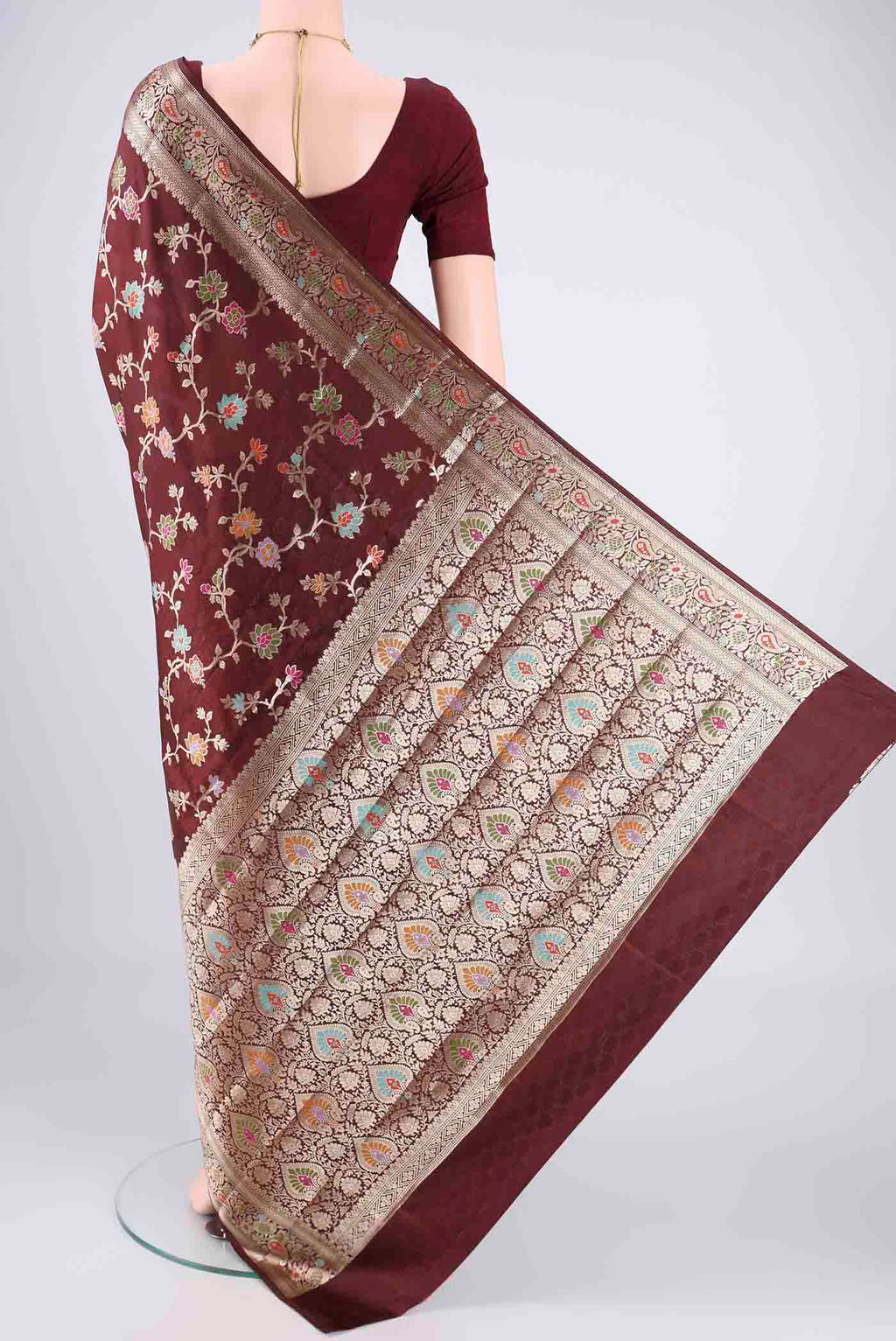Flat view of Brown Banarasi Raw Silk Saree with Zari Butta on the body and Zari Border. 