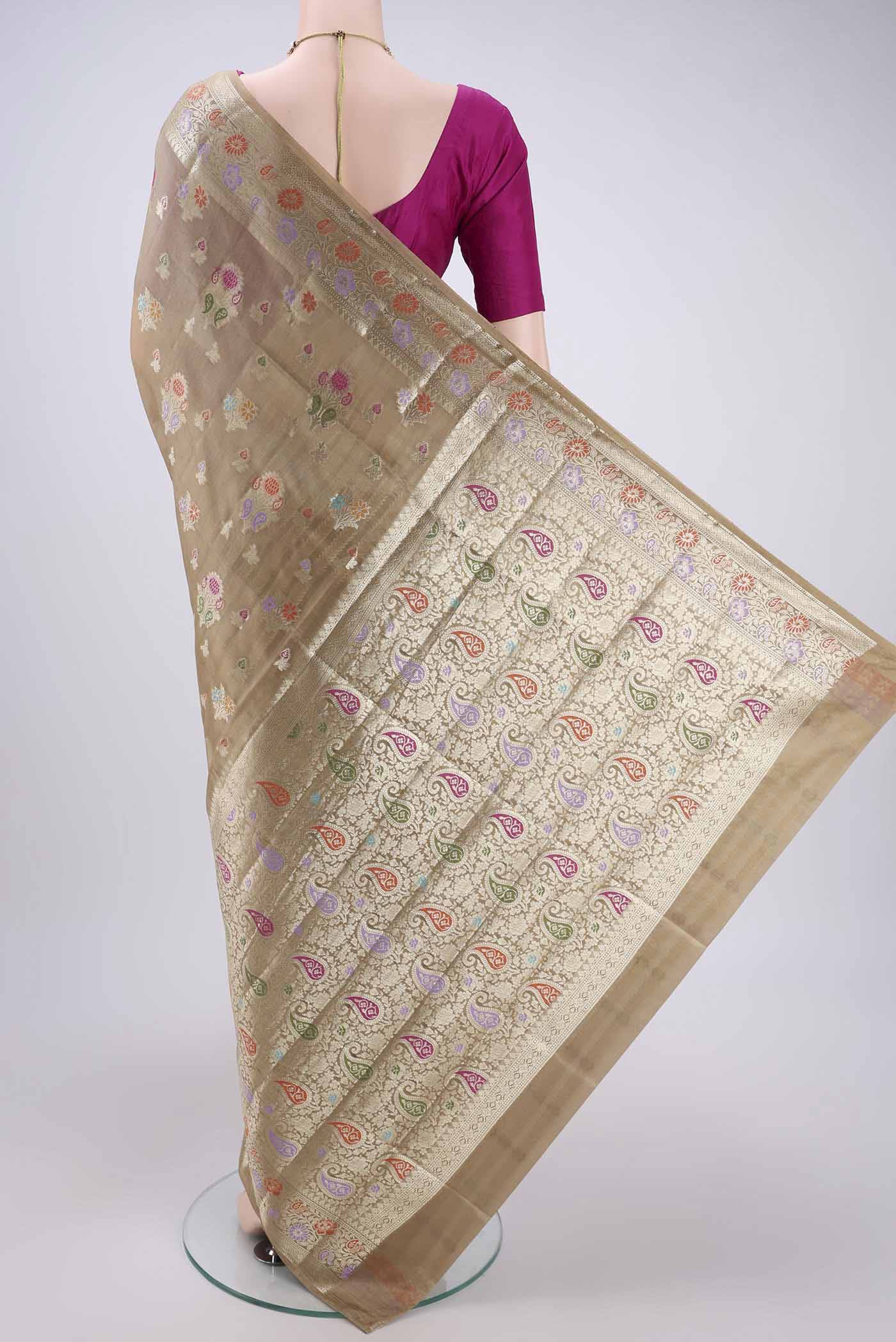 Flat view of Dark Beige Banarasi Raw Silk Saree with Zari And Thread Butta on the body and Zari And Thread Border. 