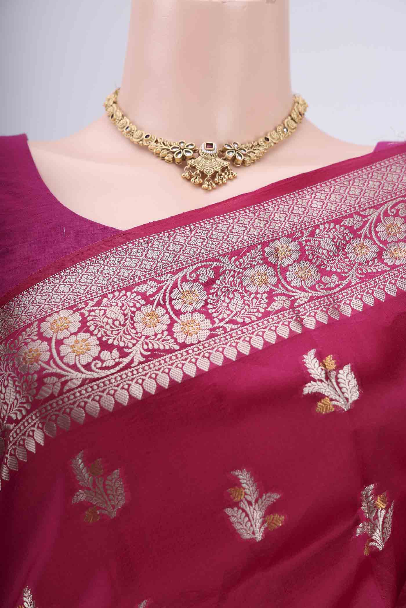 Border image of Rani Pink Banarasi Raw Silk Saree with Zari Butta on the body and Zari Border. 