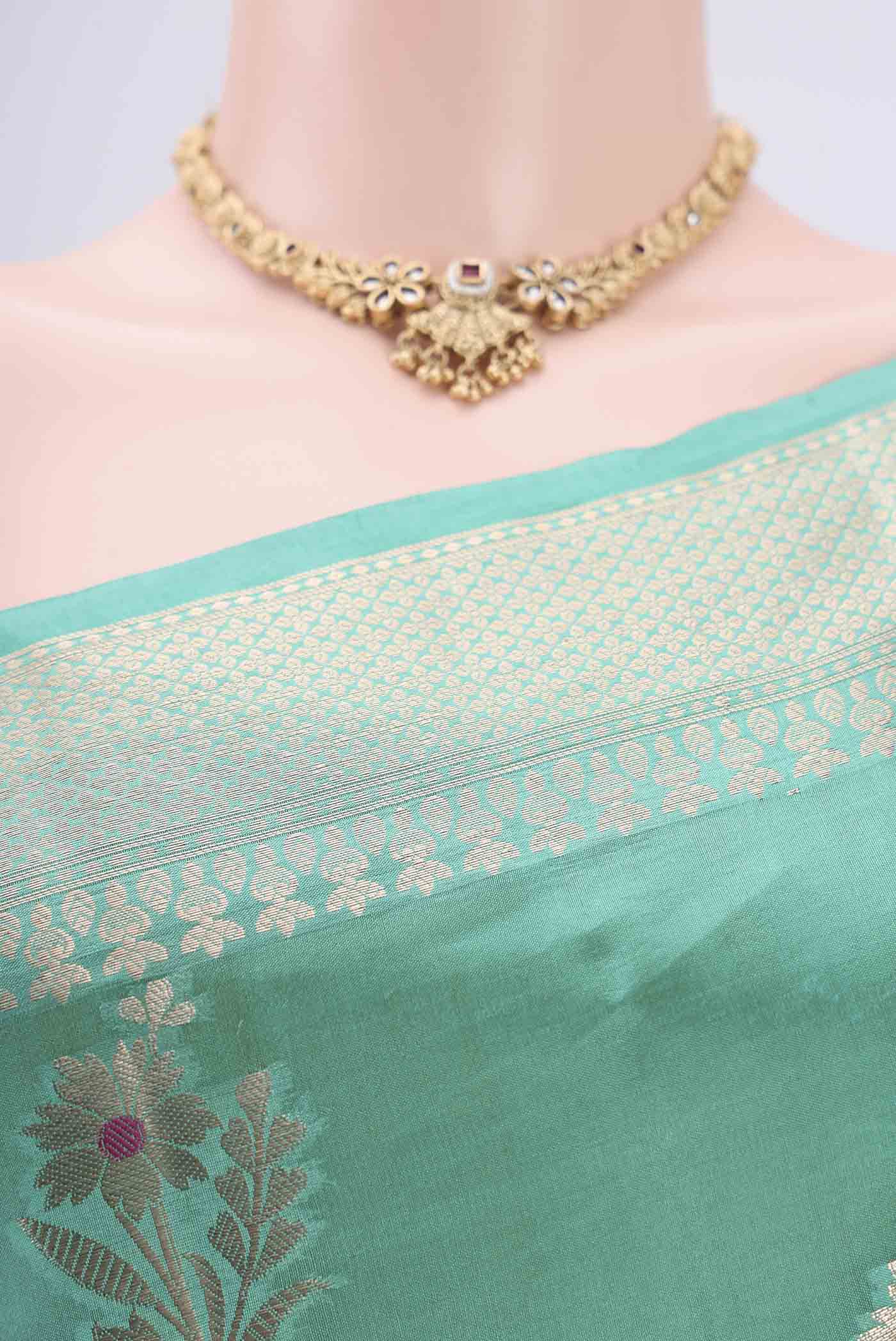 Border image of Sea Green Banarasi Raw Silk Saree with Zari Butta on the body and Zari Border. 