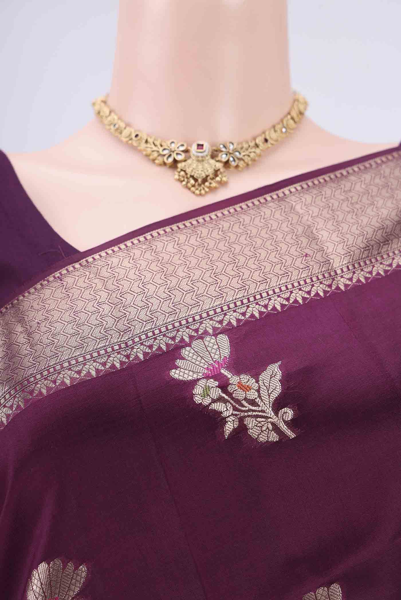 Border image of Magenta Banarasi Raw Silk Saree with Zari Butta on the body and Zari Border. 