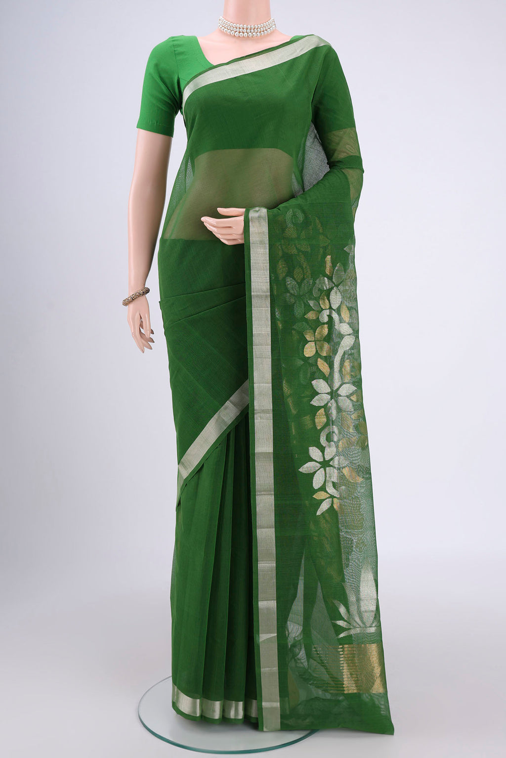Green Uppada Cotton Saree with Zari And Thread Butta on the body and Thread Border.  displayed on a mannequin