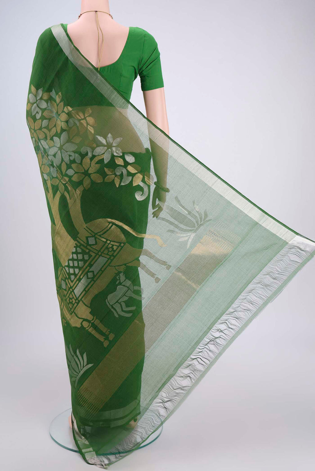 Flat view of Green Uppada Cotton Saree with Zari And Thread Butta on the body and Thread Border. 