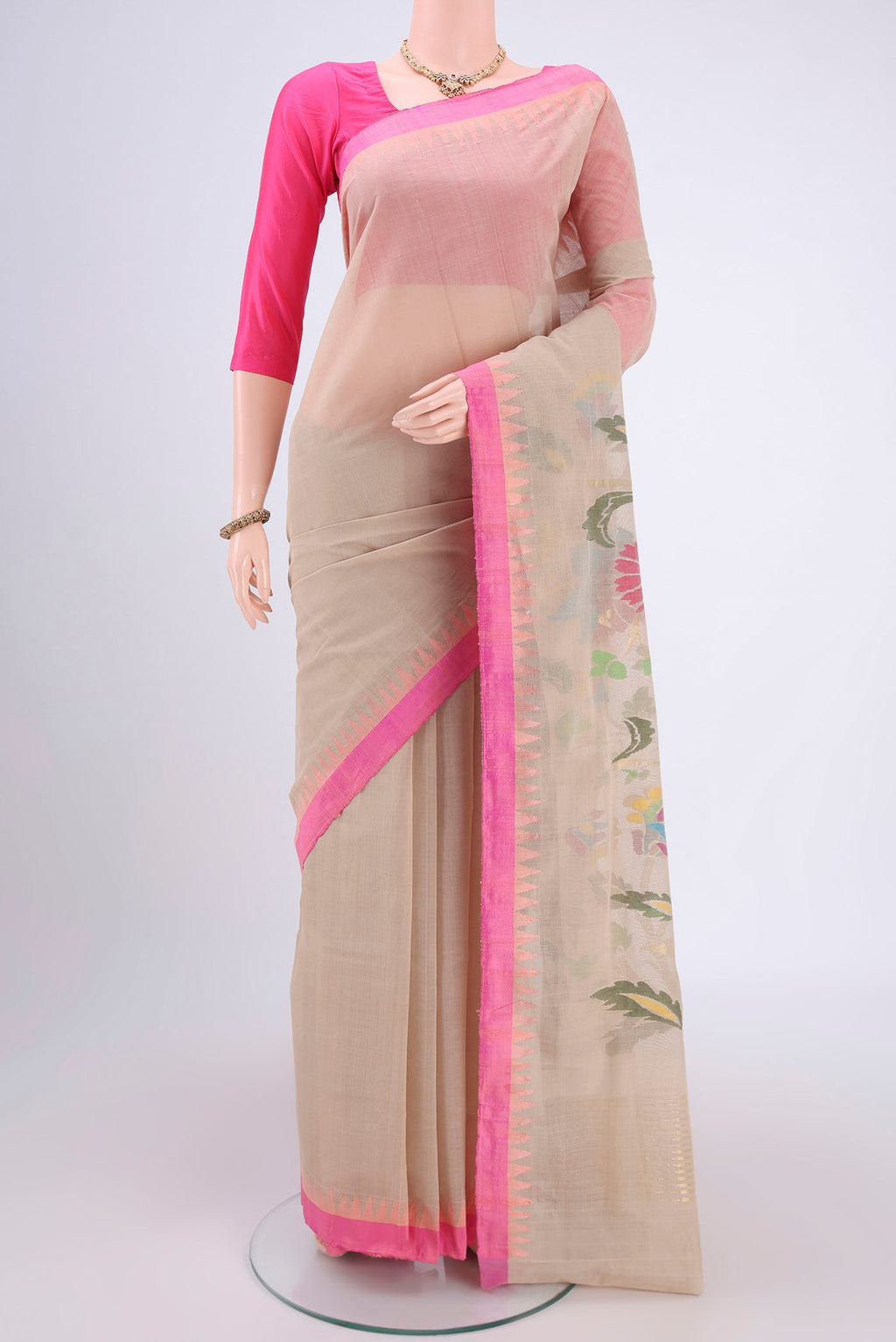 Beige Uppada Cotton Saree with Zari And Thread Butta on the body and Thread Border.  displayed on a mannequin