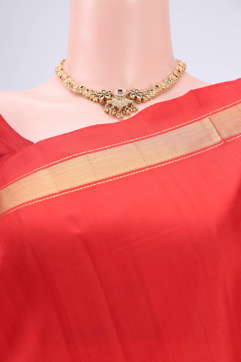 Border image of Orange Kanjivaram Silk Saree with Zari Butta on the body and One Side Border. 